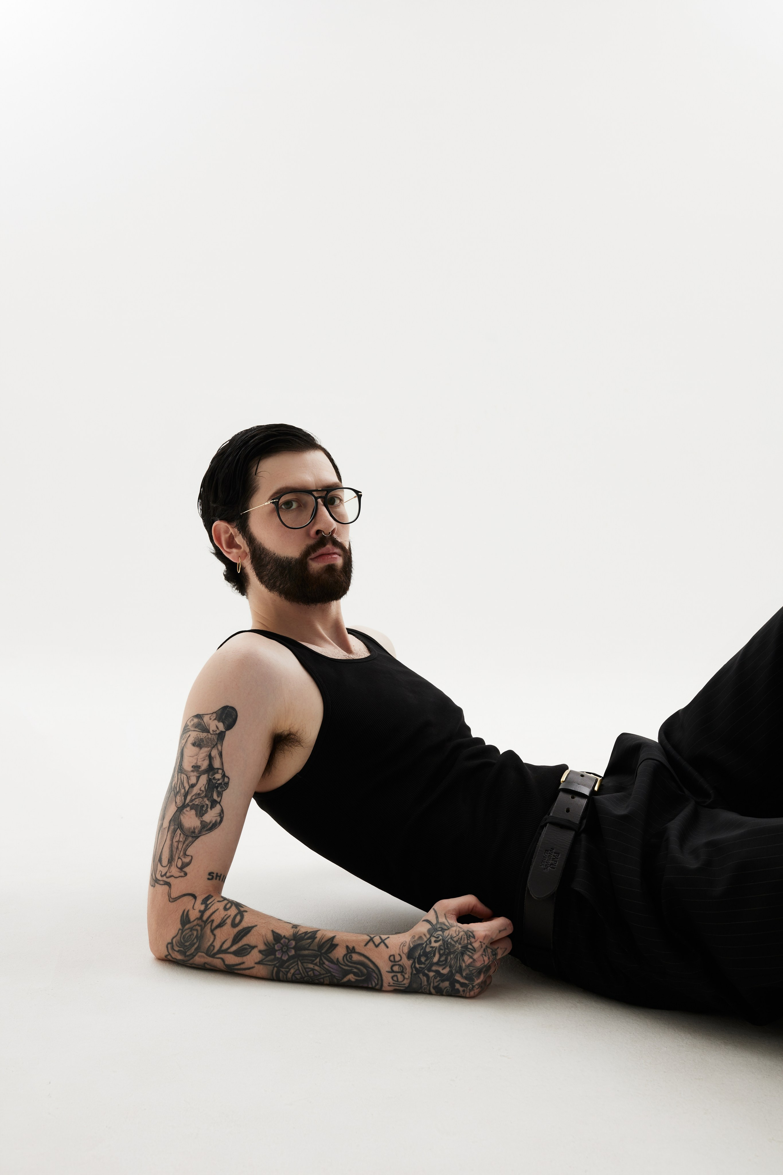 Men’s Studio Portrait: A Minimalist Style Against a White Background. Photographer & videographer in Tbilisi, Georgia