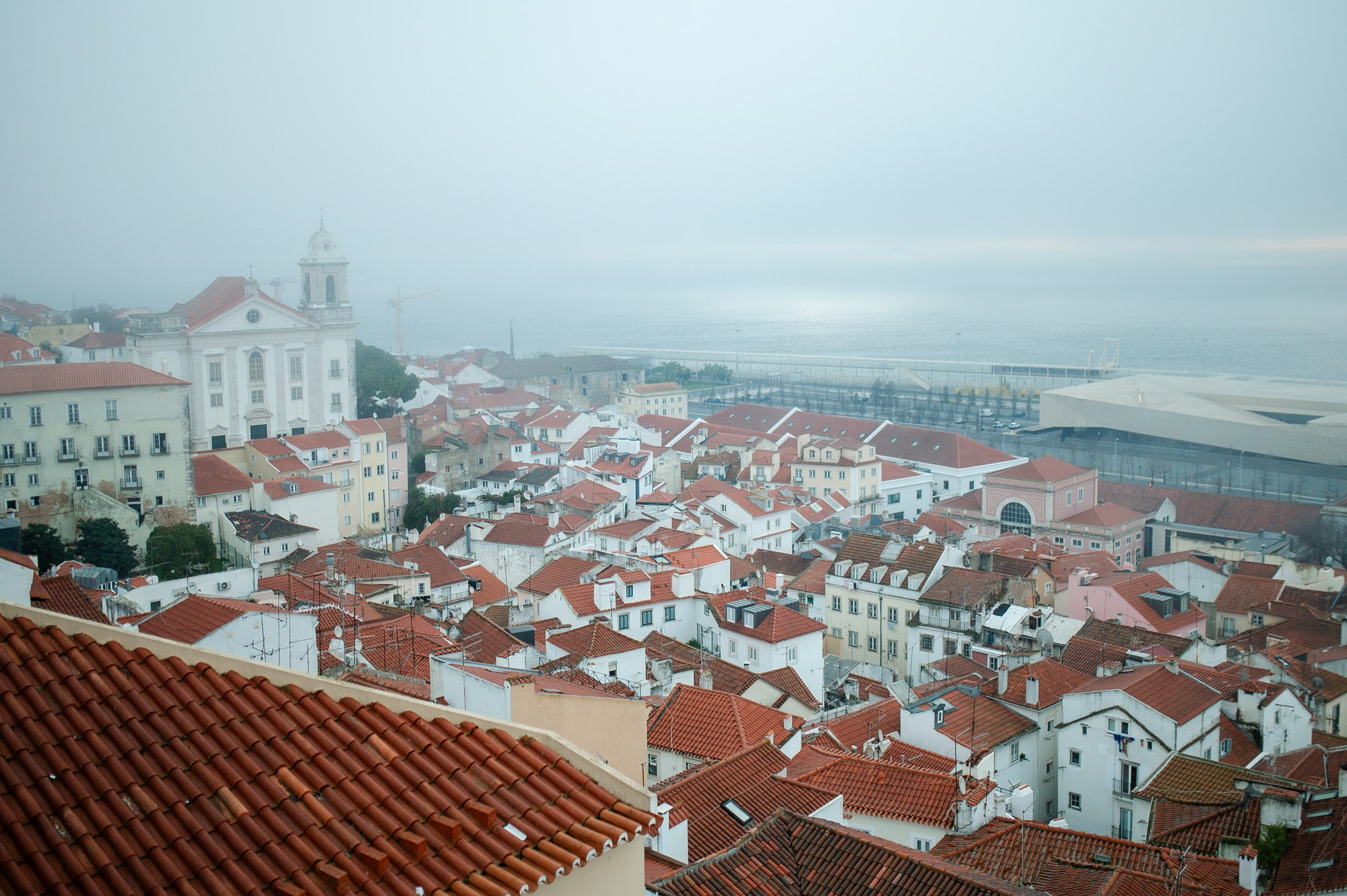 Alfama and Praça do Comércio are two iconic locations for photo shoots in Lisbon