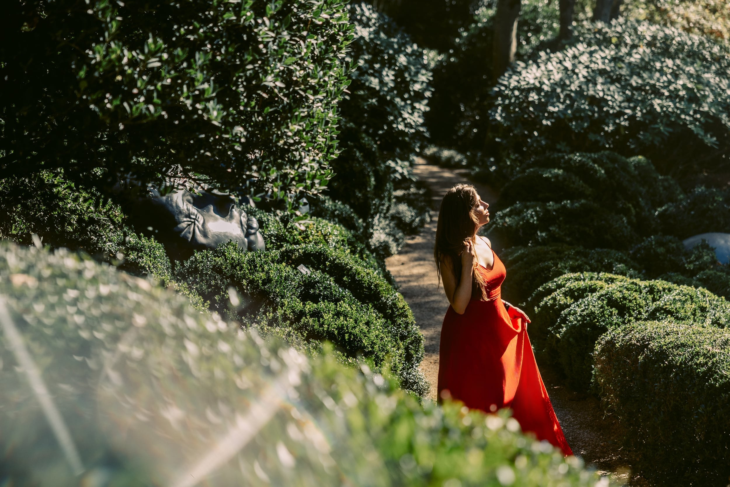 Dreamy Photoshoot in Étretat Gardens, France — Red Dress Portrait Session. Romantic & Soulful Photography by Natalia Olhova in Rotterdam