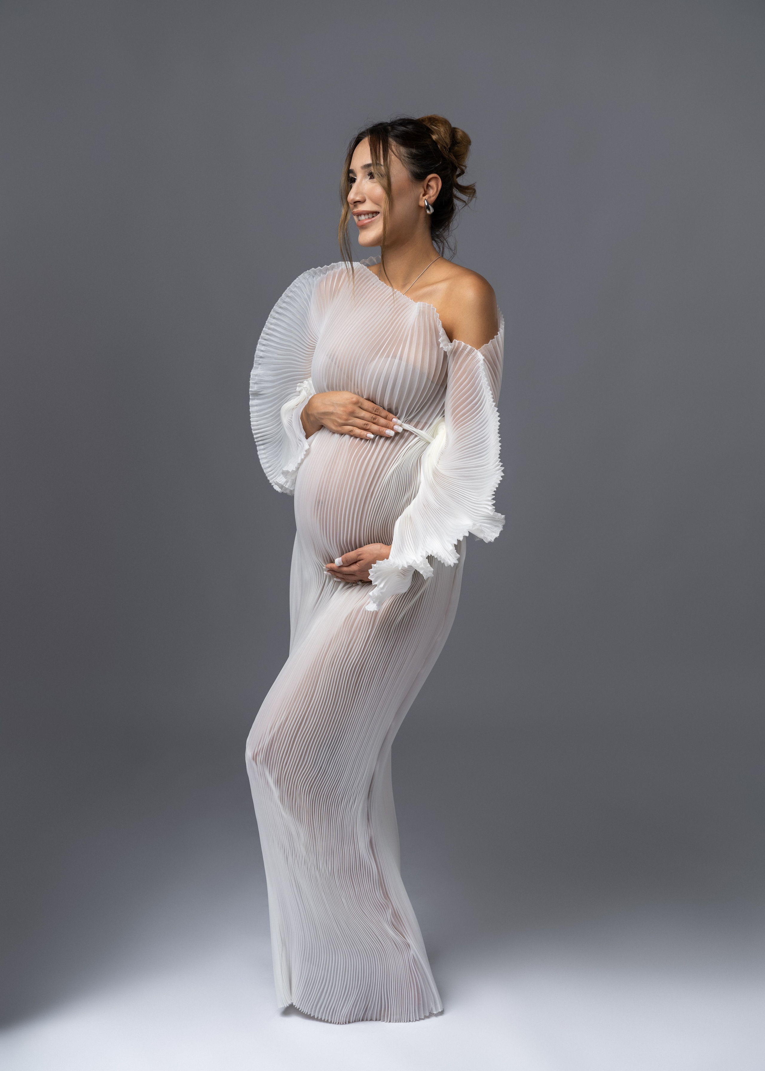 Babybauch Fotoshooting. Anna, Fotografin aus Wien, Österreich. Ich fotografiere in folgenden Genres: Babybauch-, Familien-, Mode- und Weihnachtsfotografie