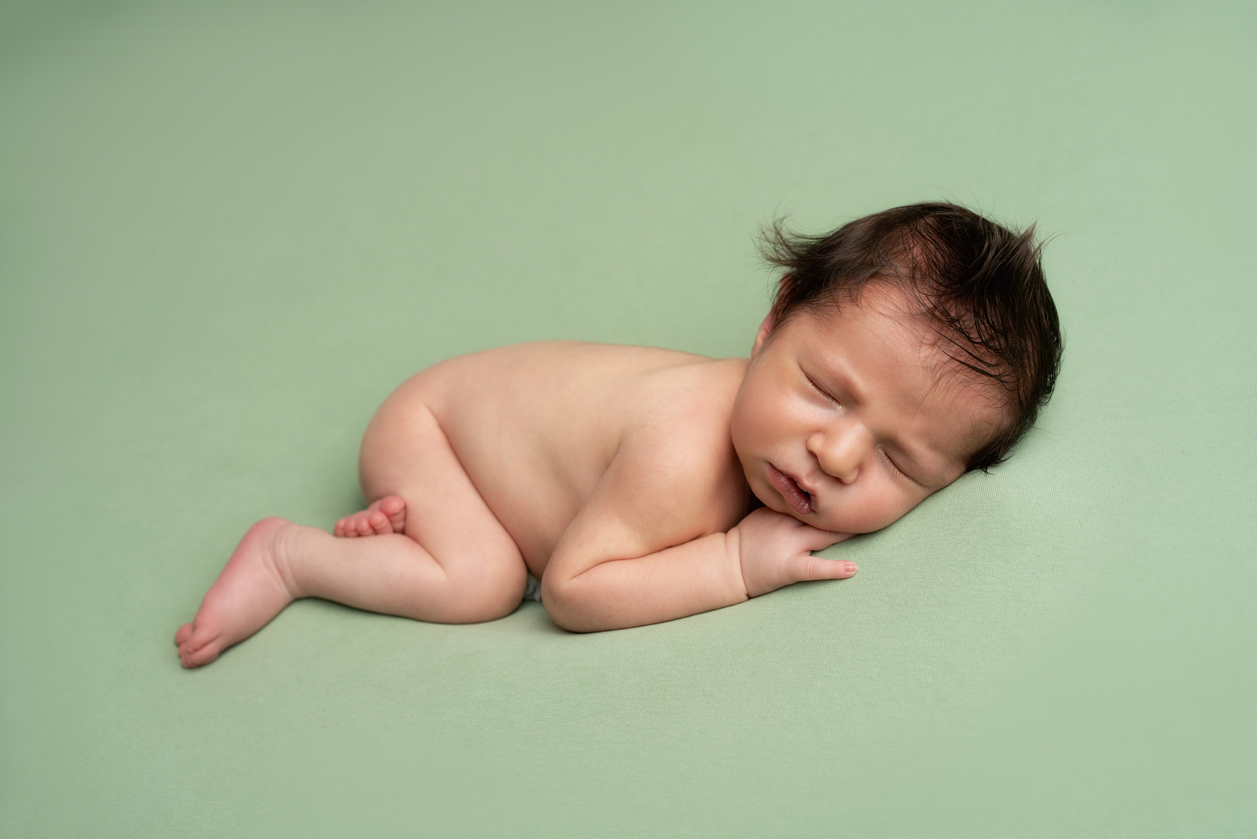 Naturverbundenheit des Babys in Beige und Grün