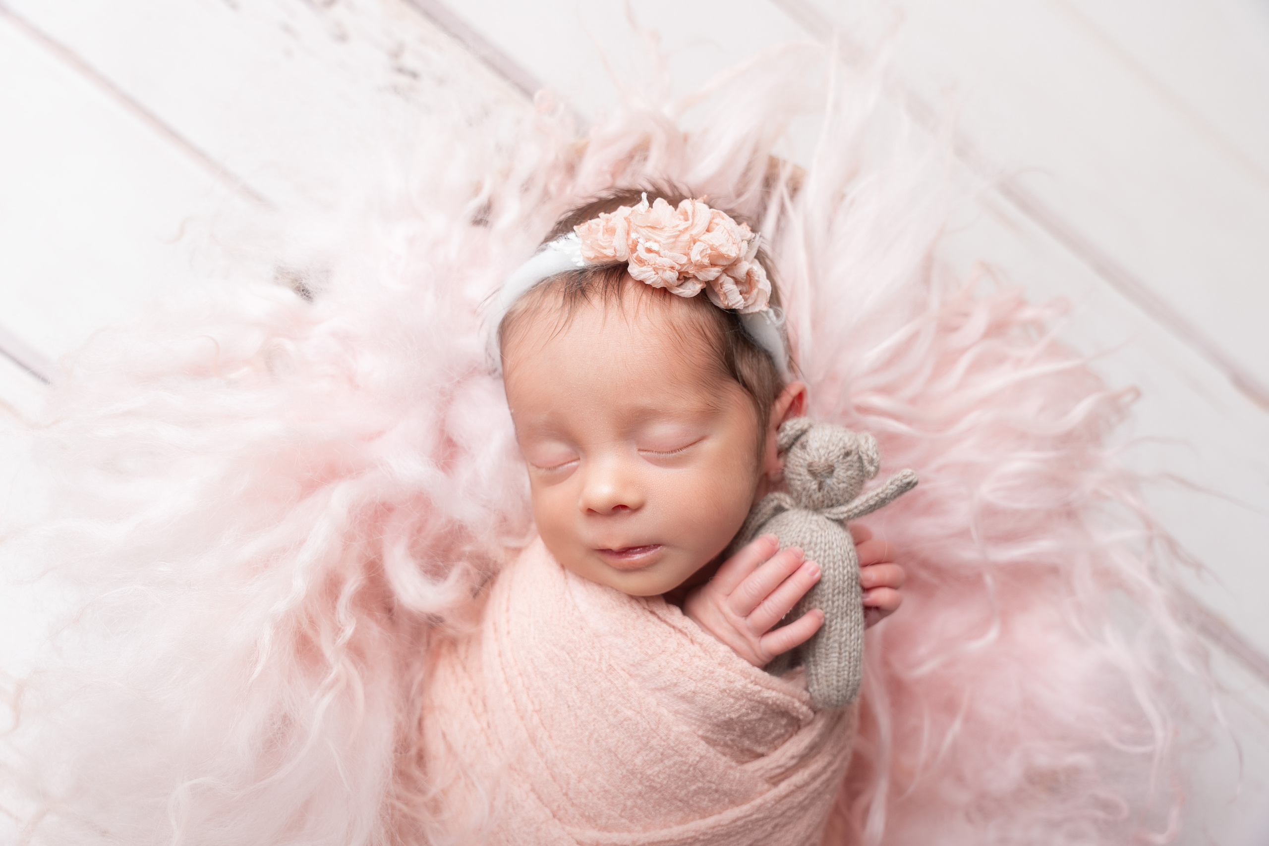 Roséfarbene Neugeborenenbilder