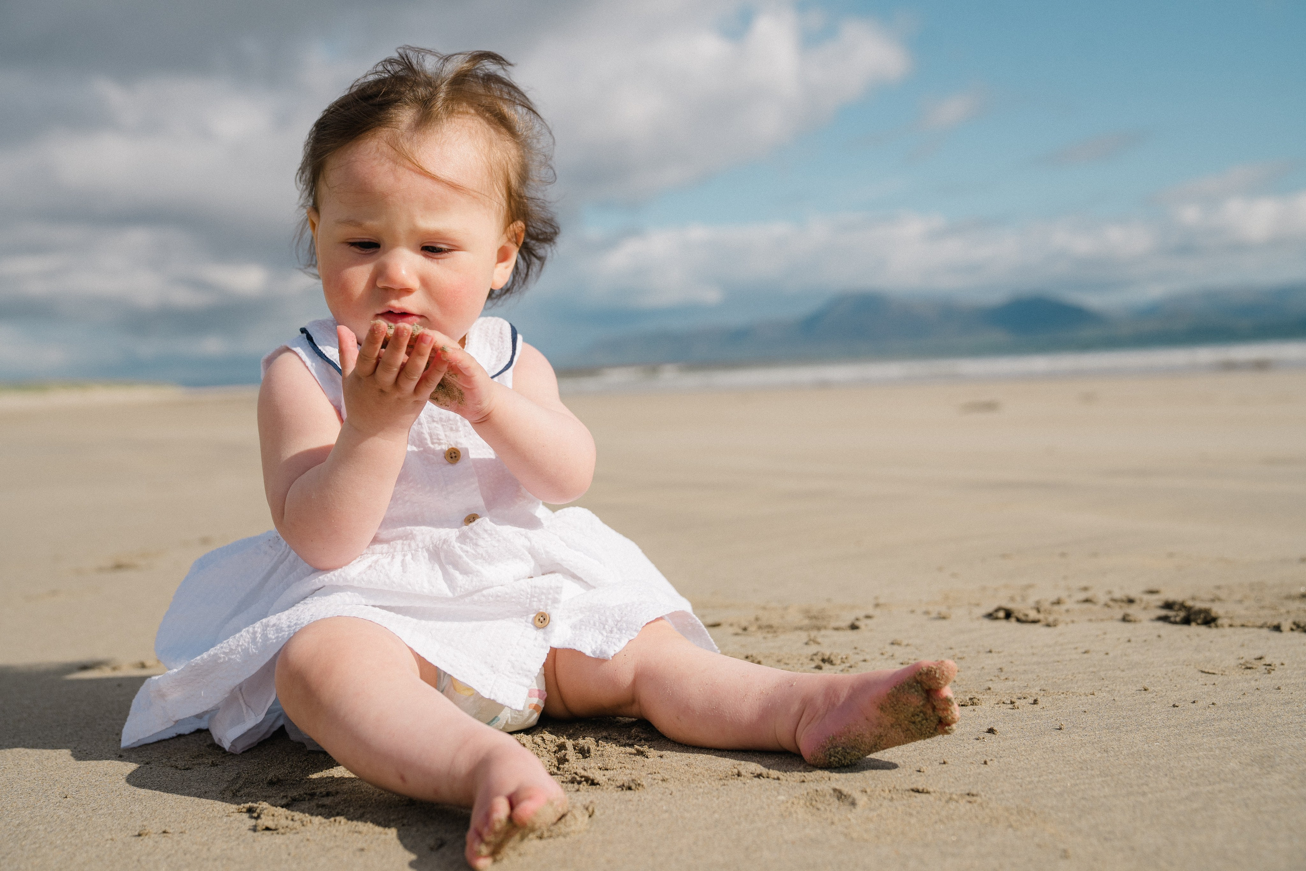 Darya and Mia at the ocean. Wedding and family photographer Ireland