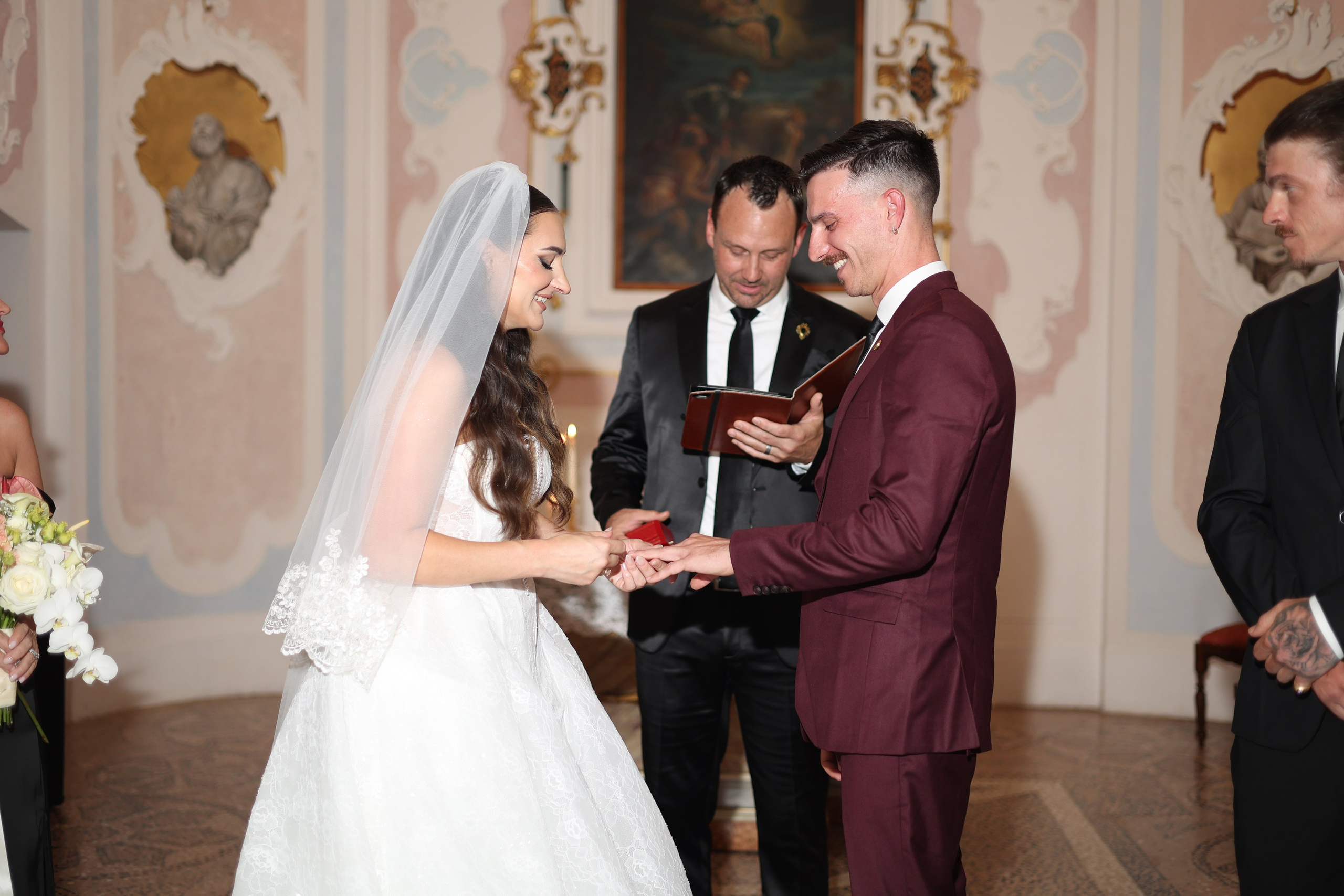 Romantic wedding ceremony inside a historic Italian church.