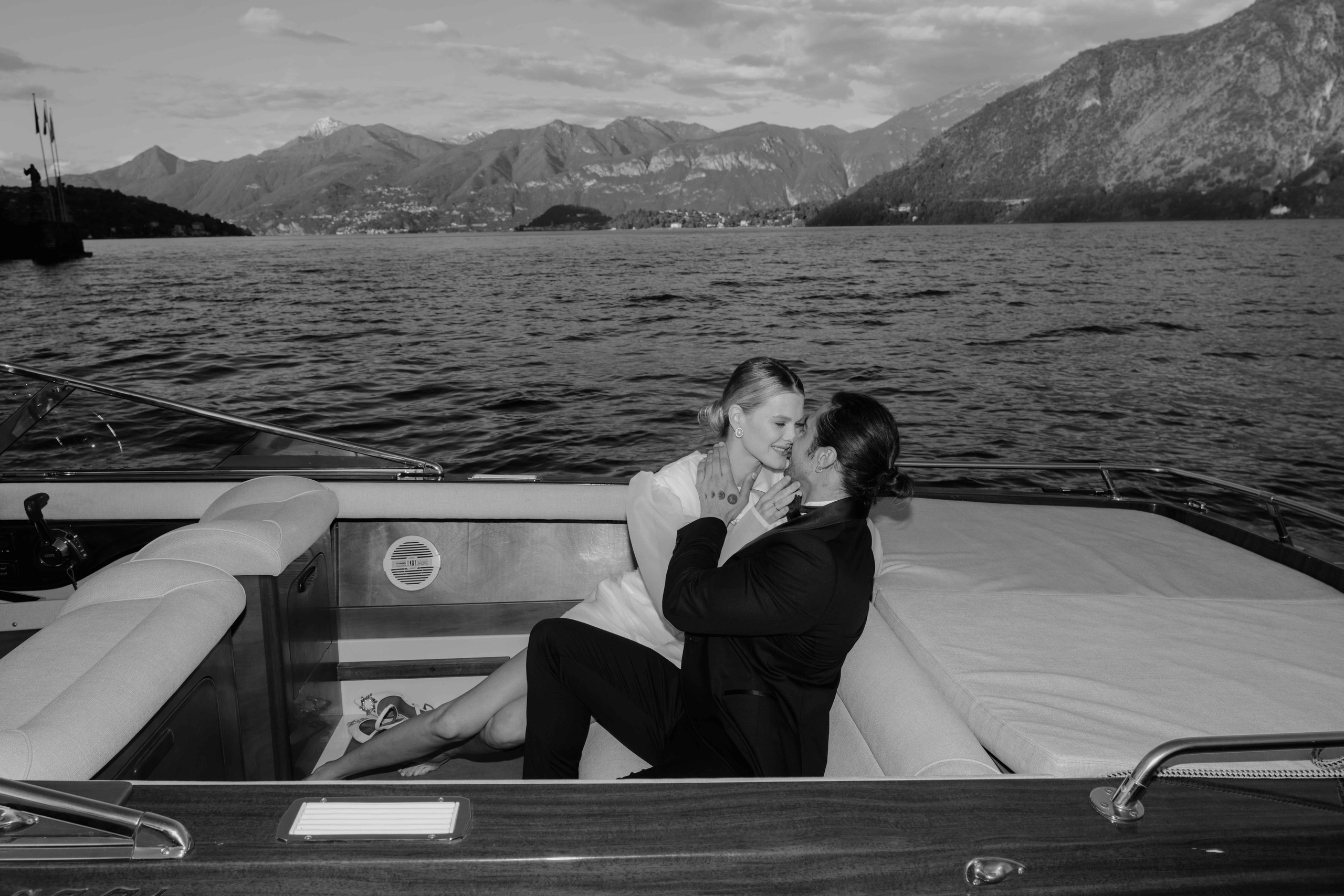     minimal boat scene Lake Como elopement cinematic mood