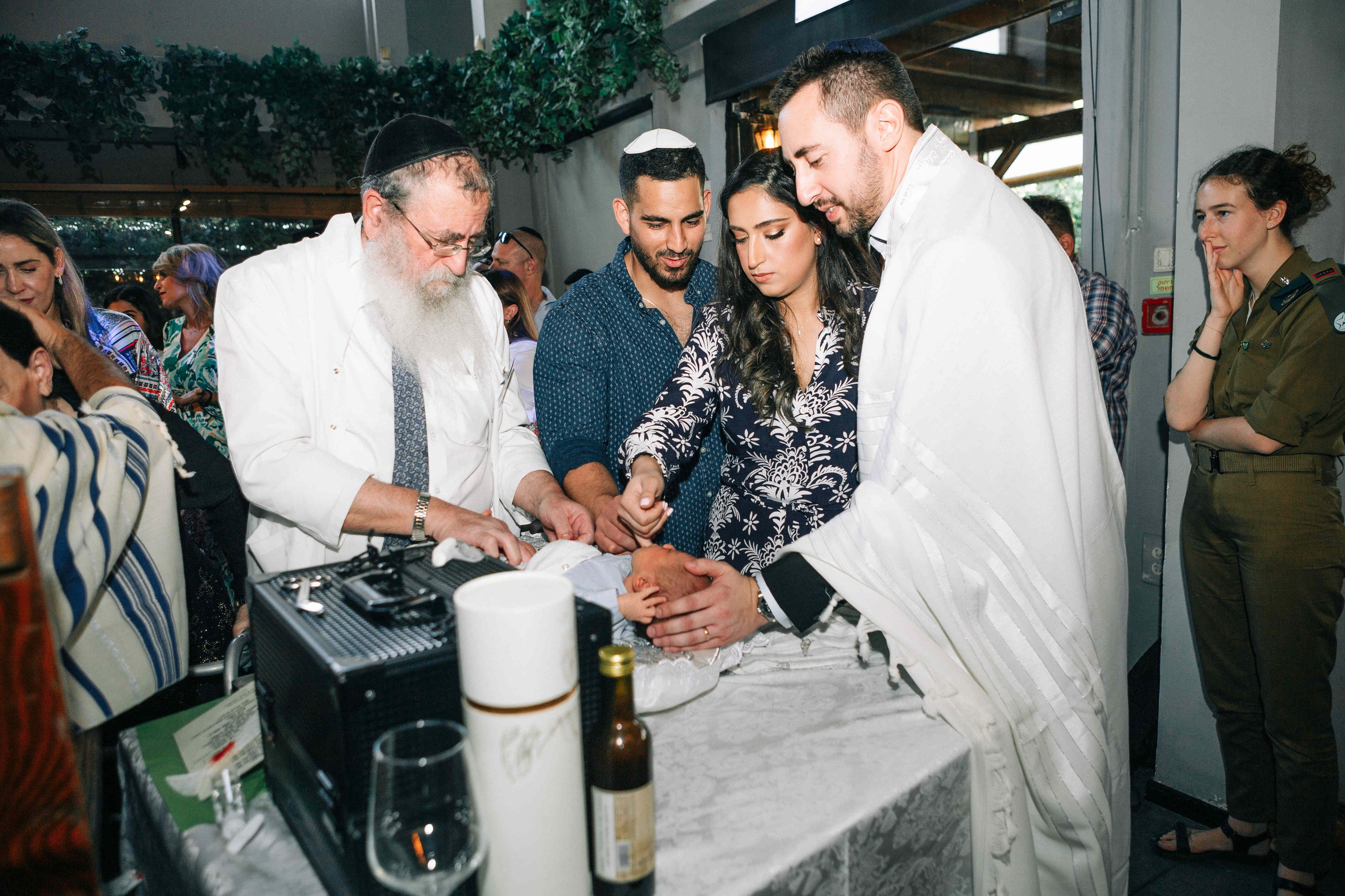 BRIT MILA (BIG EVENT). PHOTOGRAPHER IN ISRAEL