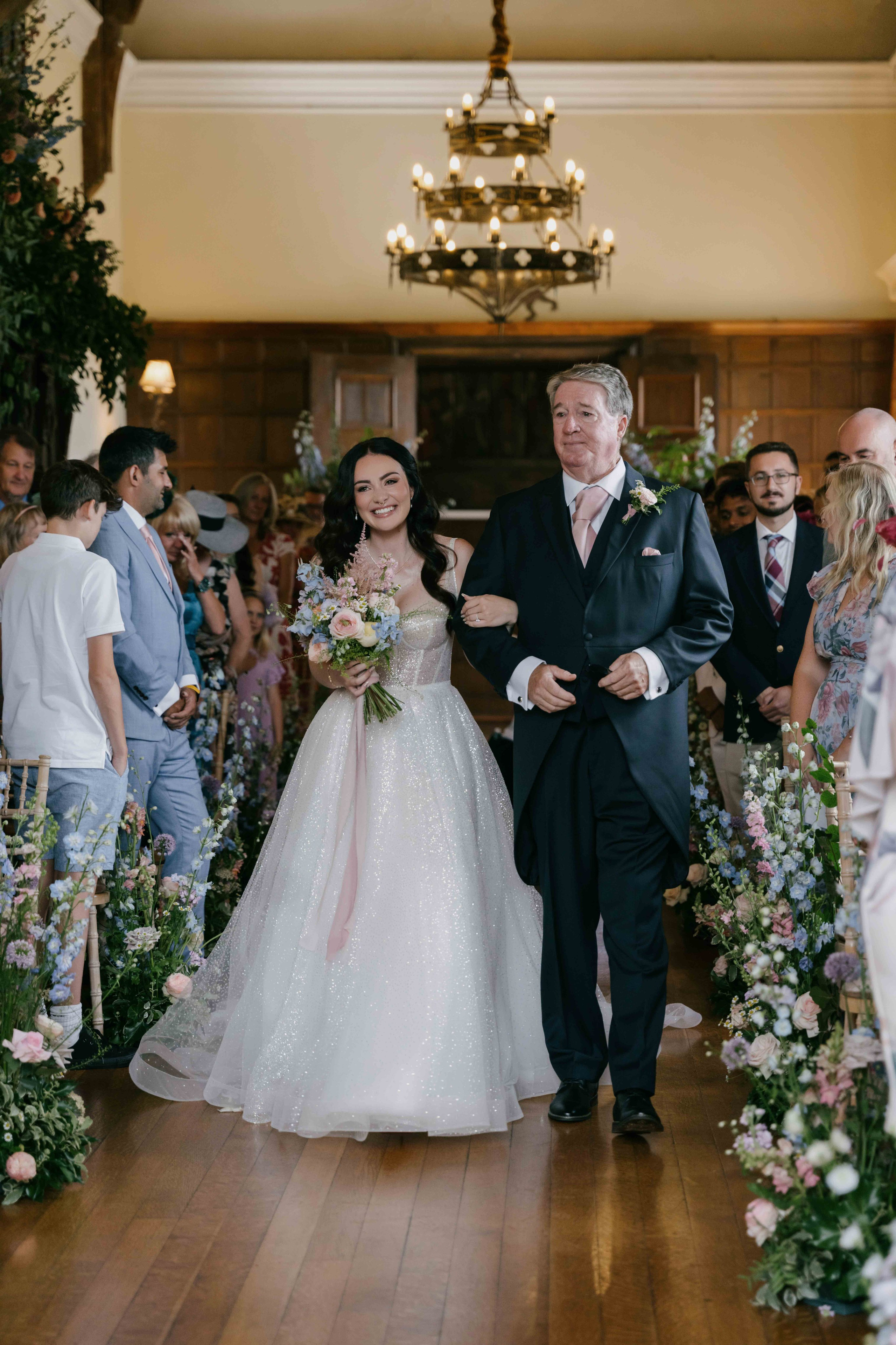    bride walking down the aisle Essex wedding venue
