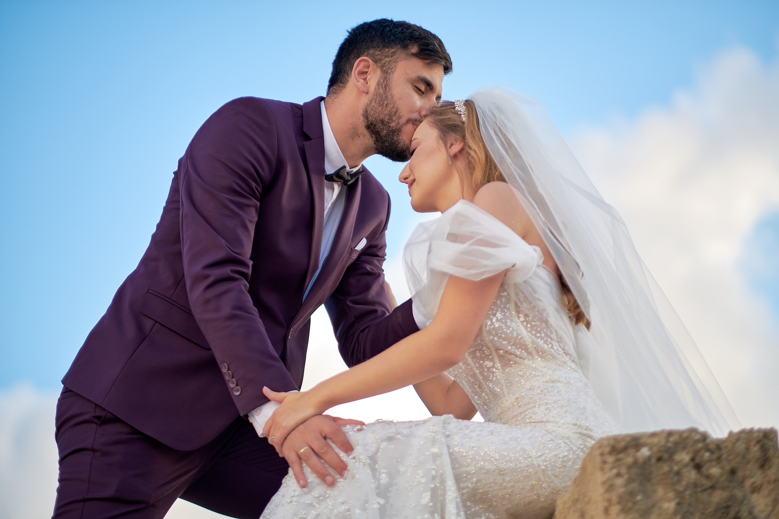 Romantic wedding couple portrait, bride with veil and groom in suit, emotional wedding photography by Maxim Polak Israel