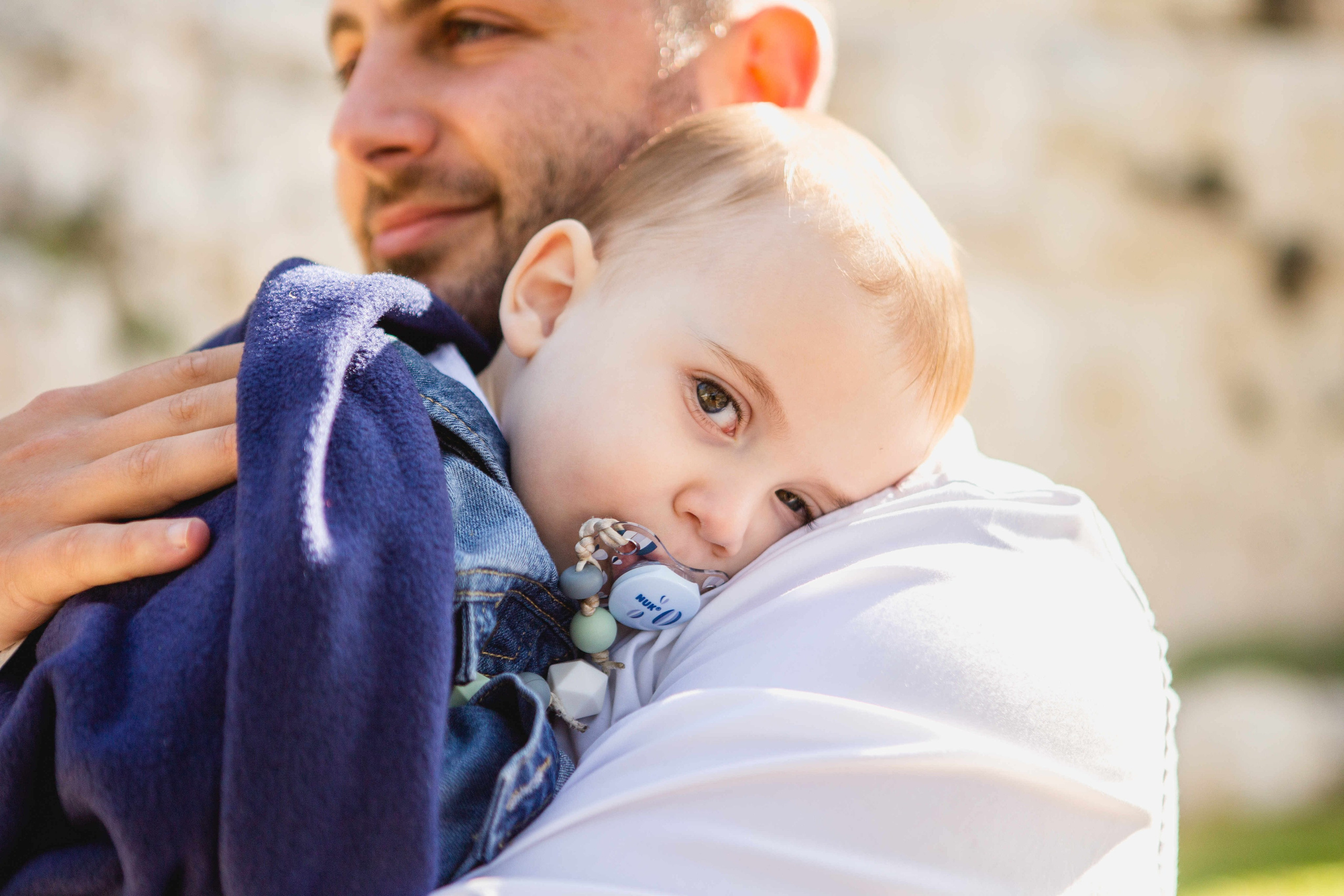 AT THE WALLS OF THE OLD CITY. PHOTOGRAPHER IN ISRAEL