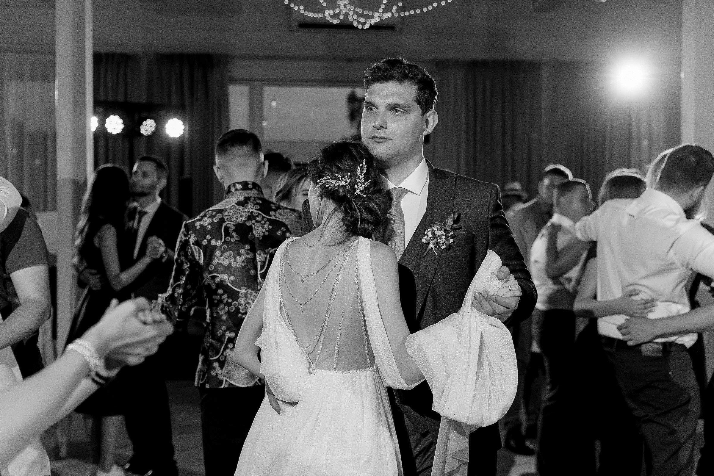 Couple’s dance floor embrace, by Cornwall wedding photographer.