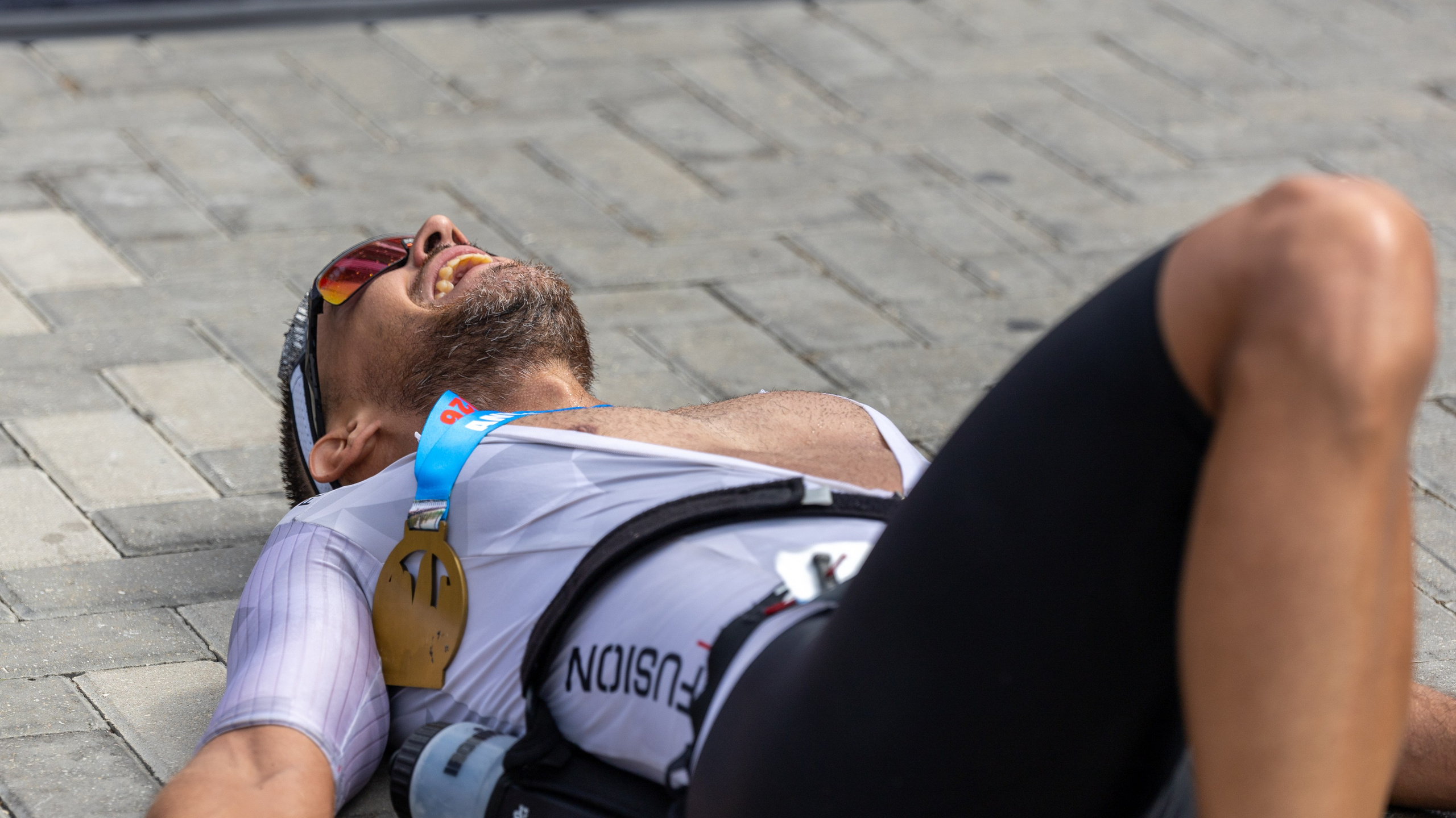 IRONMAN 70.3 Runner. Commercial, Event, Sport, Food and Product Photographer