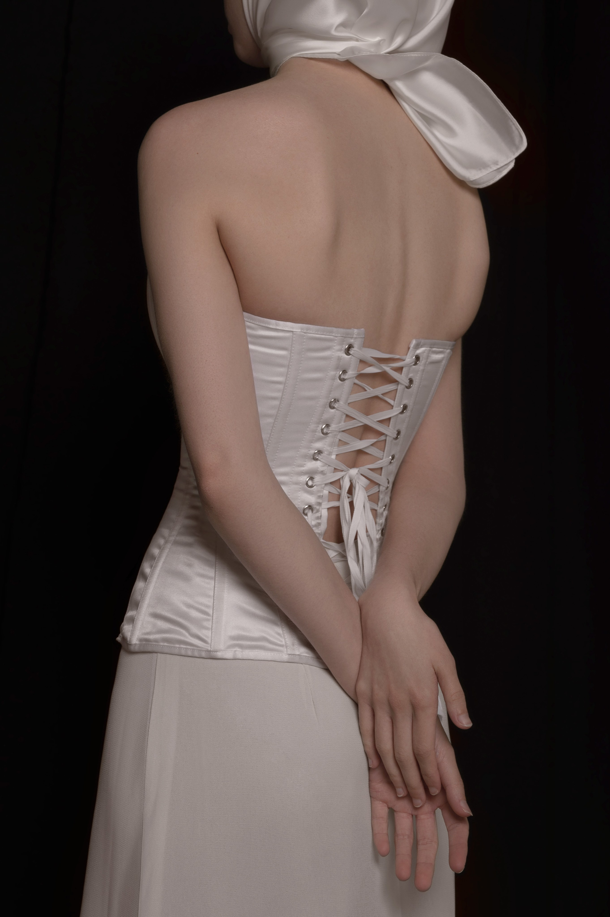 Elegant female fashion portrait in studio, soft light and professional retouching for model portfolio in San Francisco.