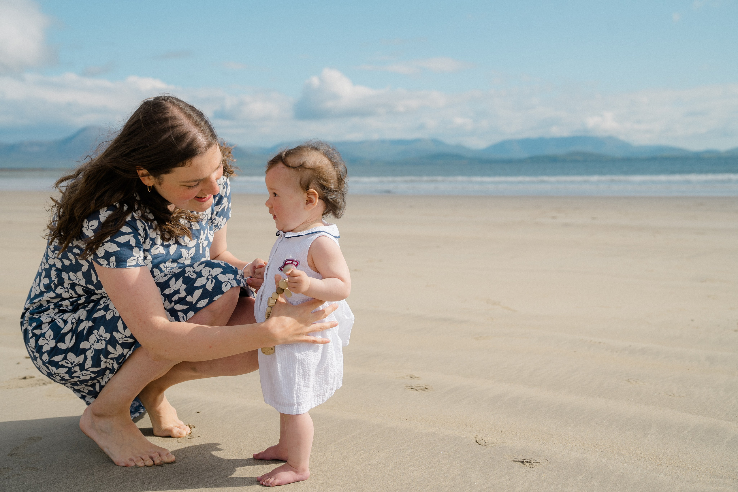 Darya and Mia at the ocean. Wedding and family photographer Ireland