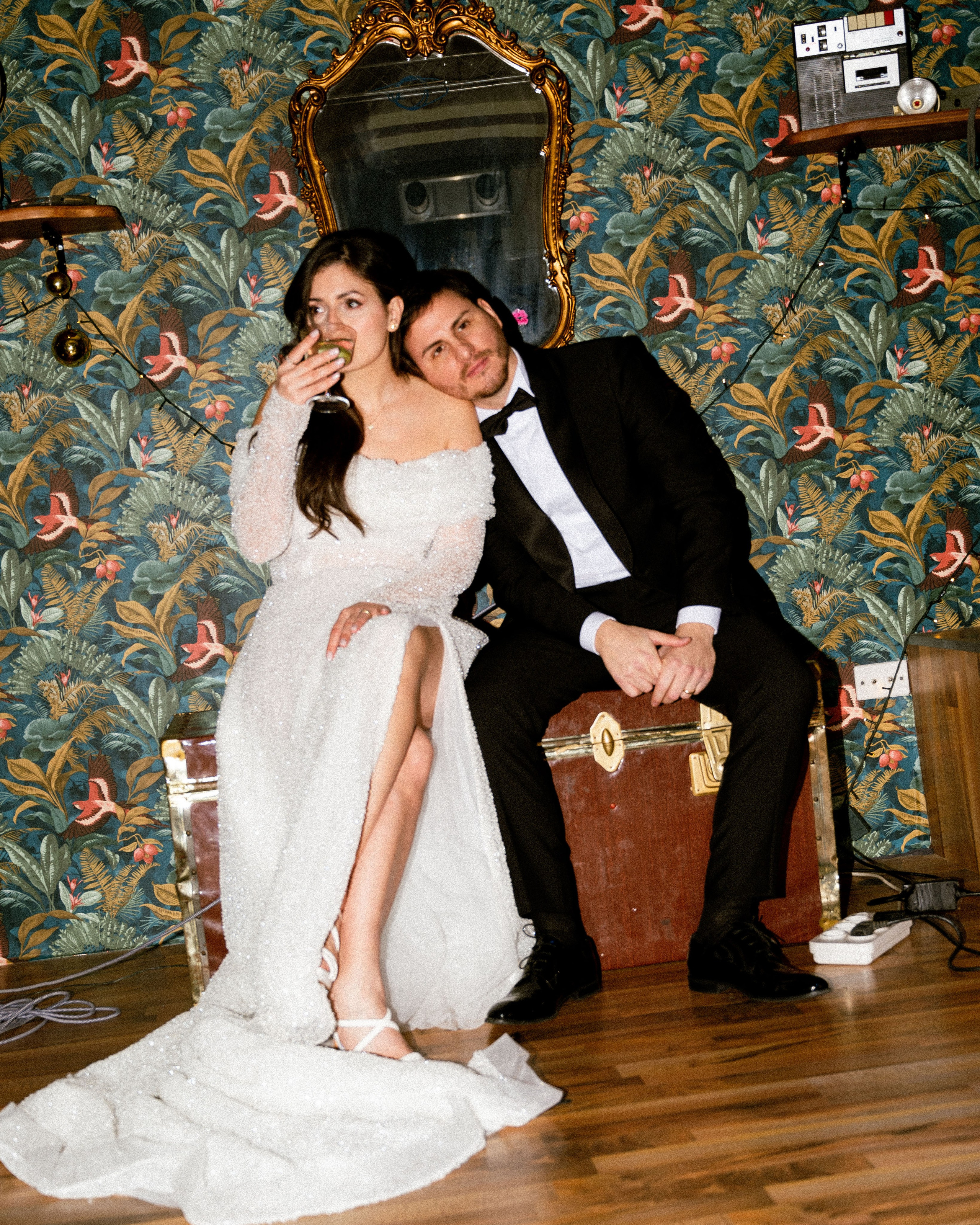 Couple seated in a venue, enjoying drinks together