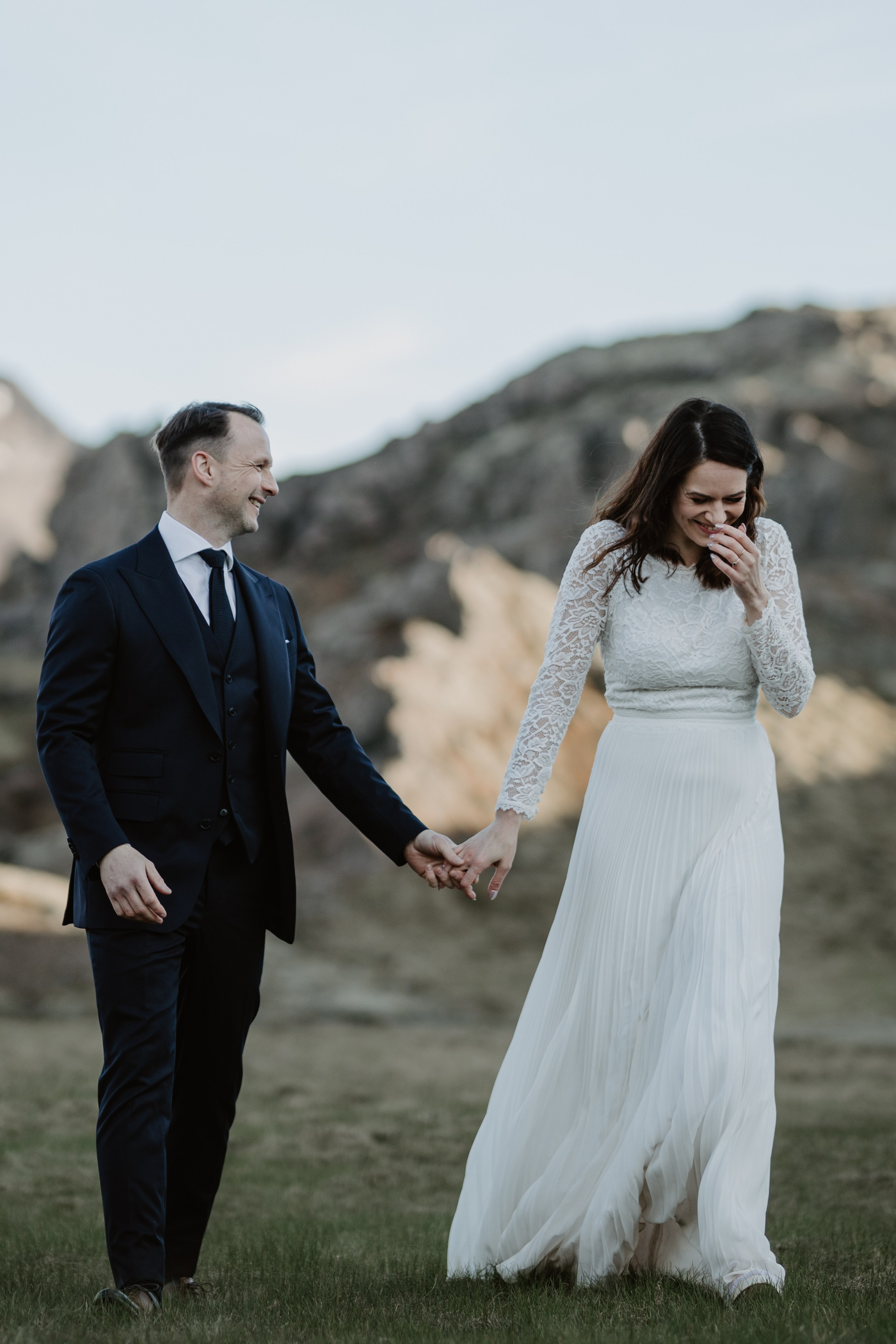 Candid couple’s moment in Iceland’s untamed wilderness, where love meets adventure