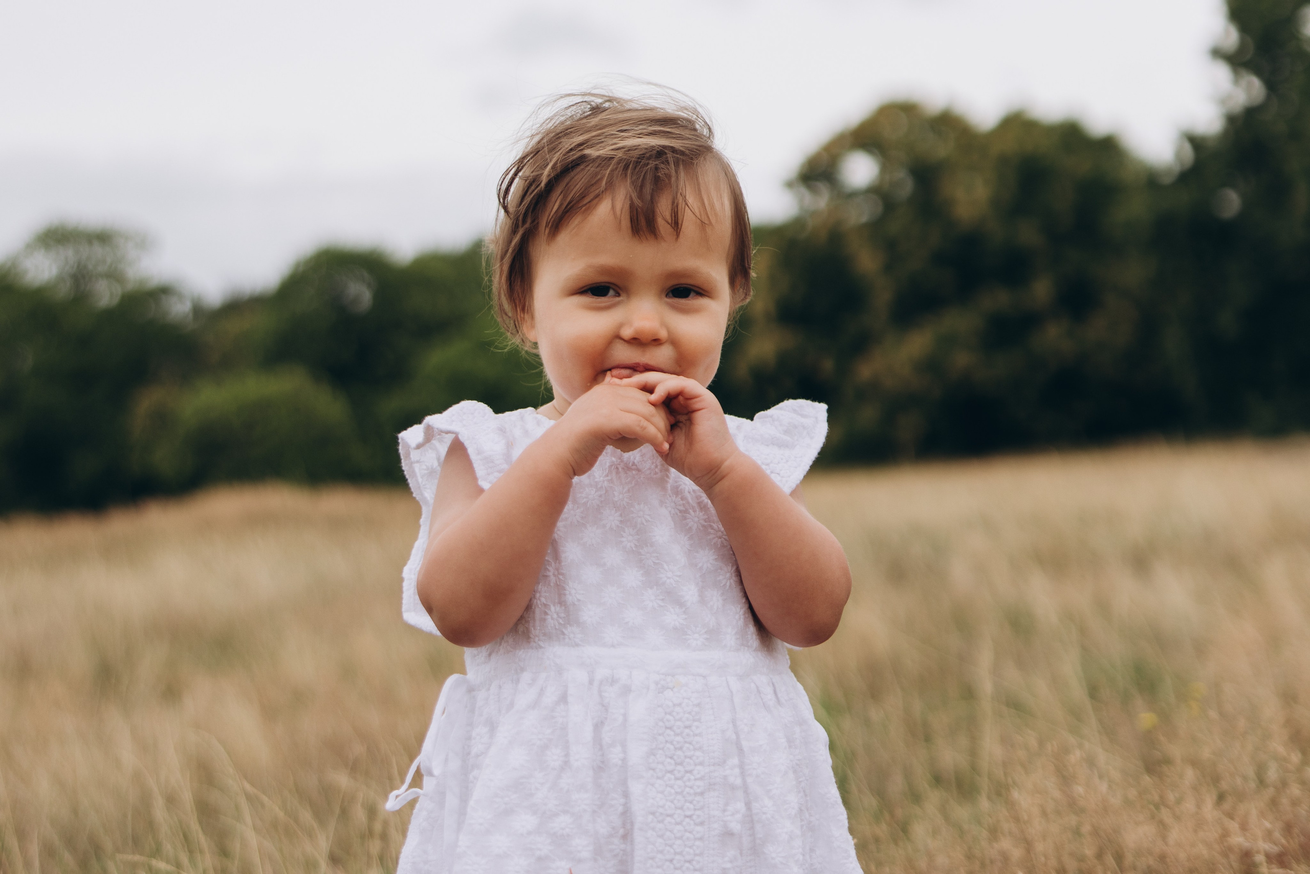 Milena with parents (Greenwich Park). Anastasia Klink, Photographer in London
