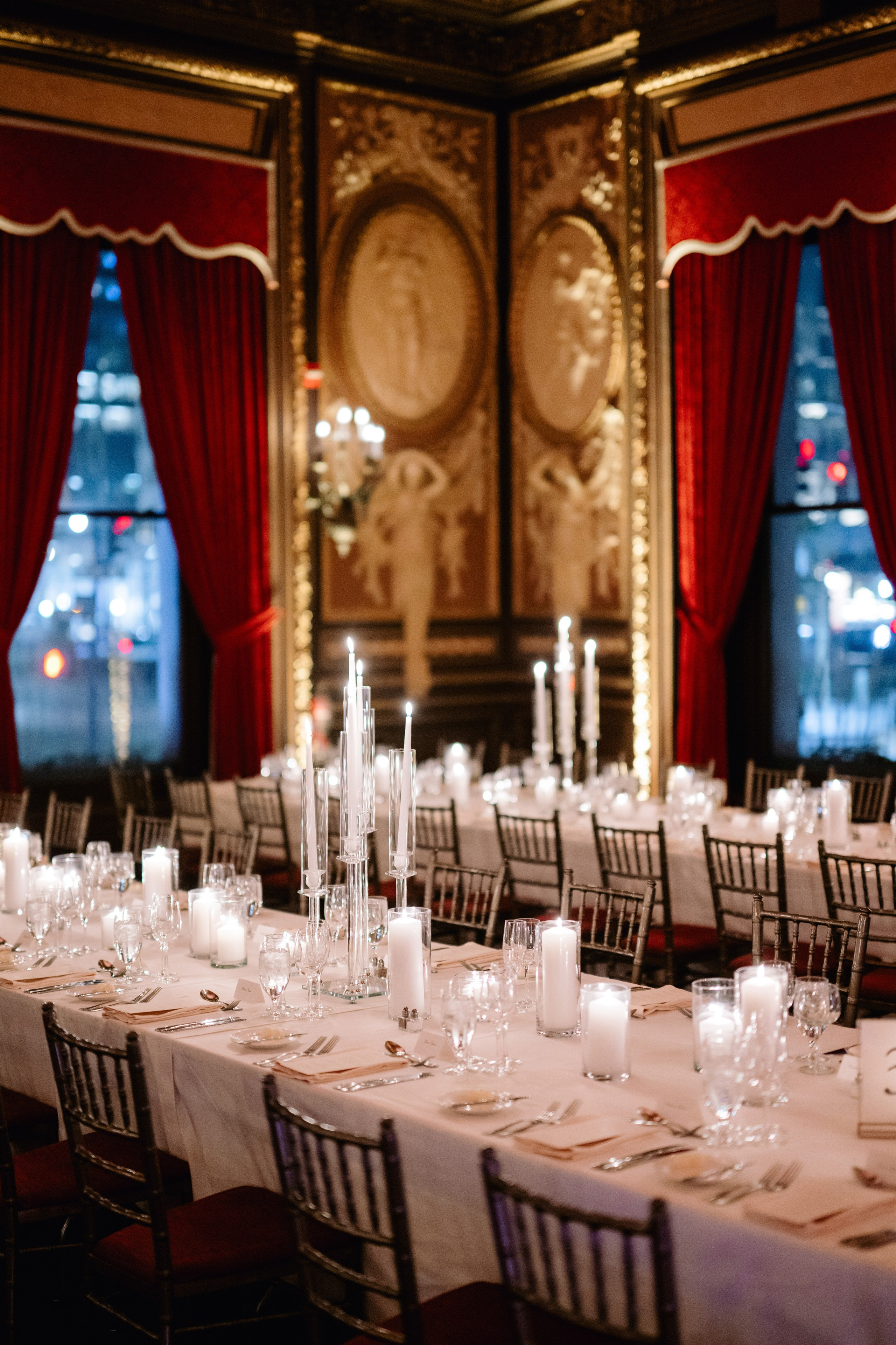 a long table with white tablecloths