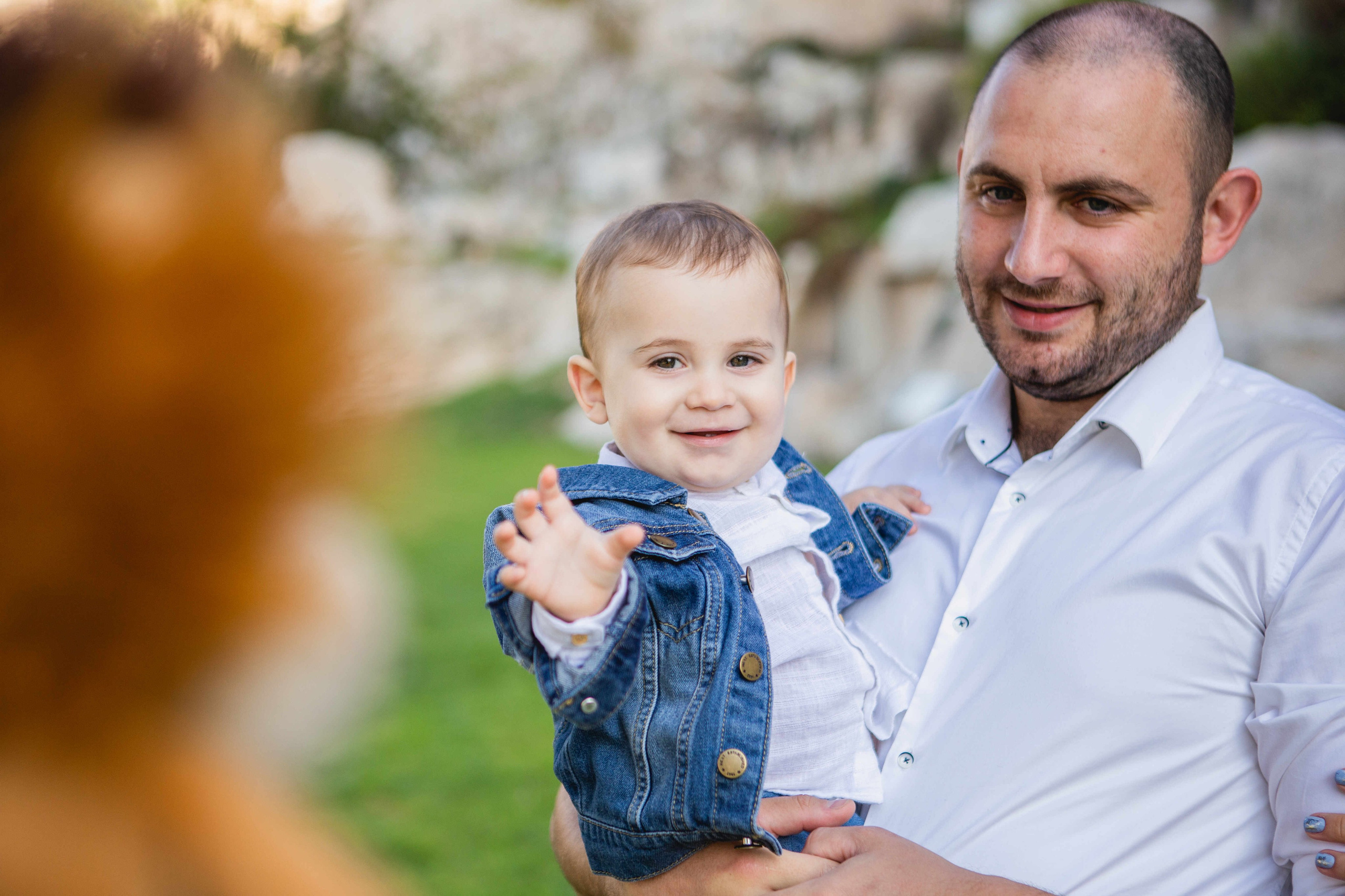 AT THE WALLS OF THE OLD CITY. PHOTOGRAPHER IN ISRAEL