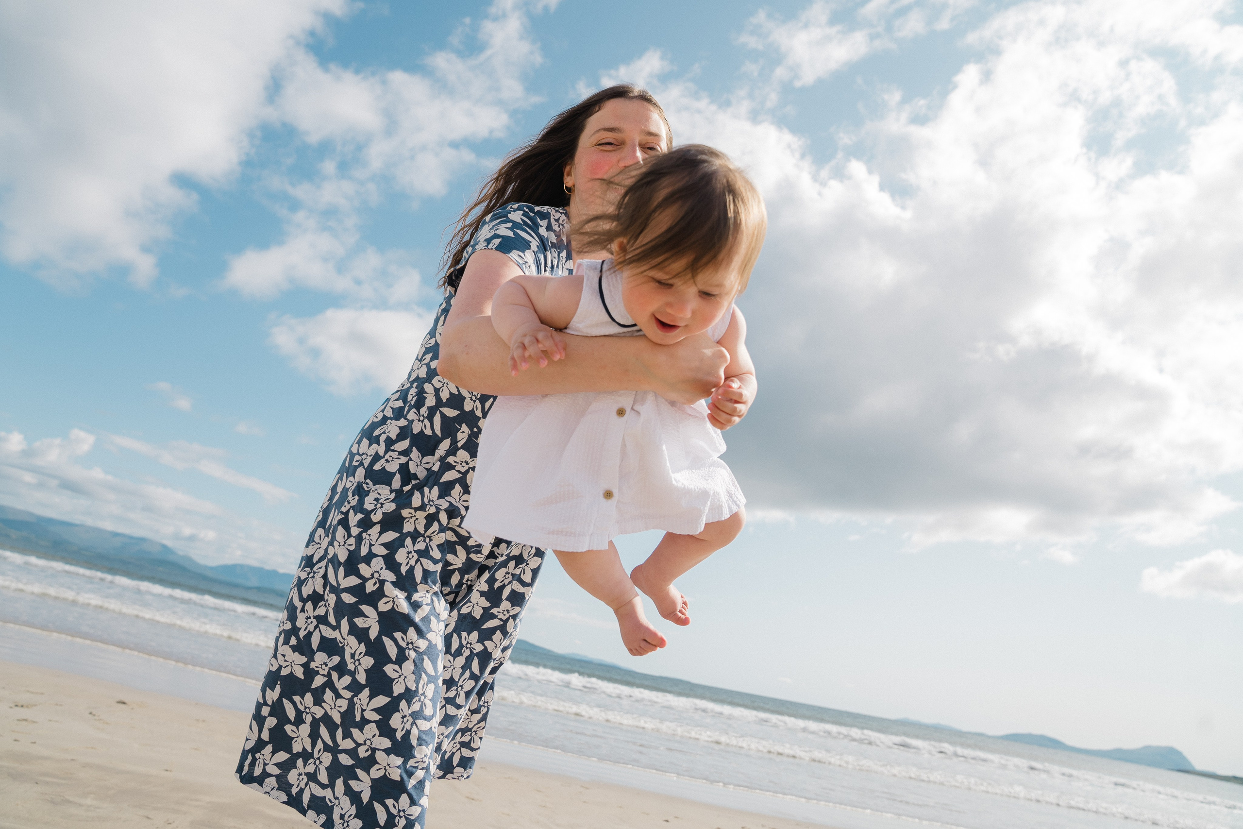 Darya and Mia at the ocean. Wedding and family photographer Ireland