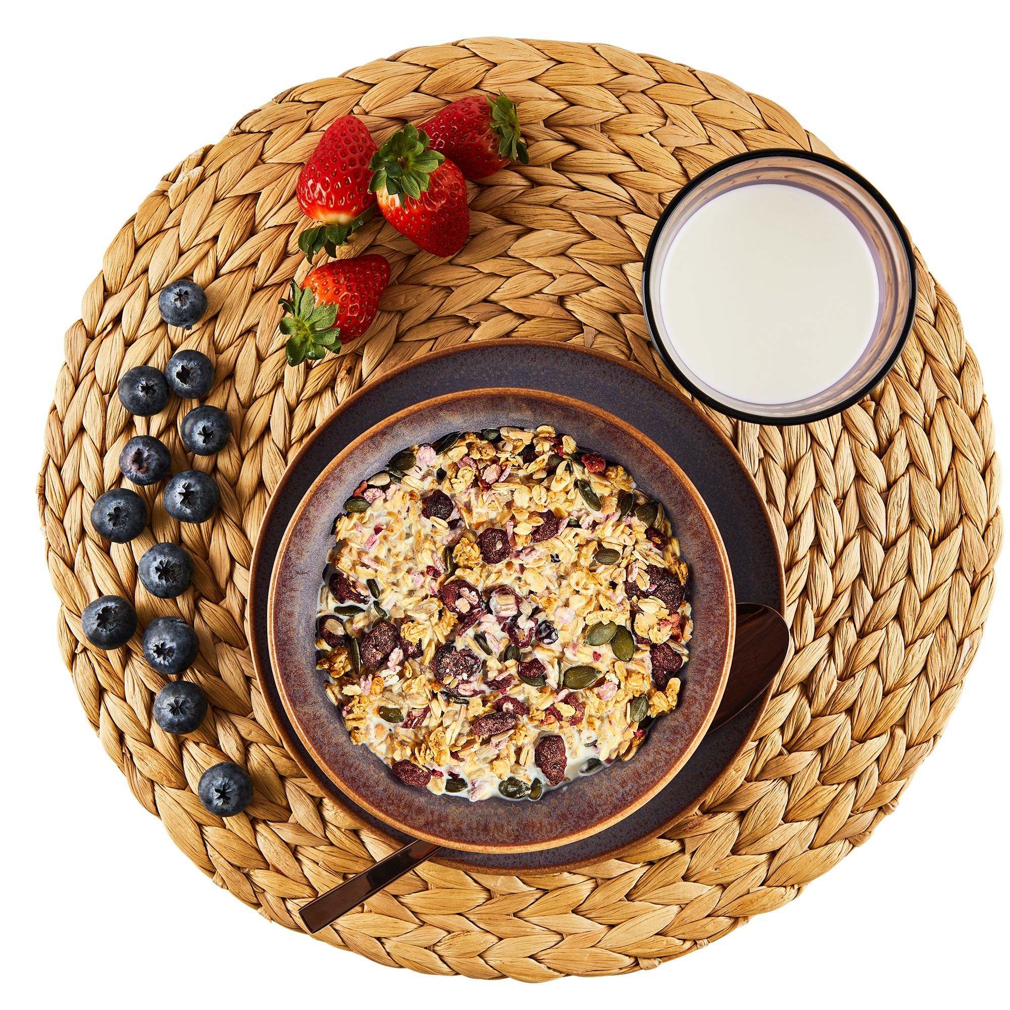 Photographer Roman Djuzev - Top view of breakfast with granola, berries and milk on white background.