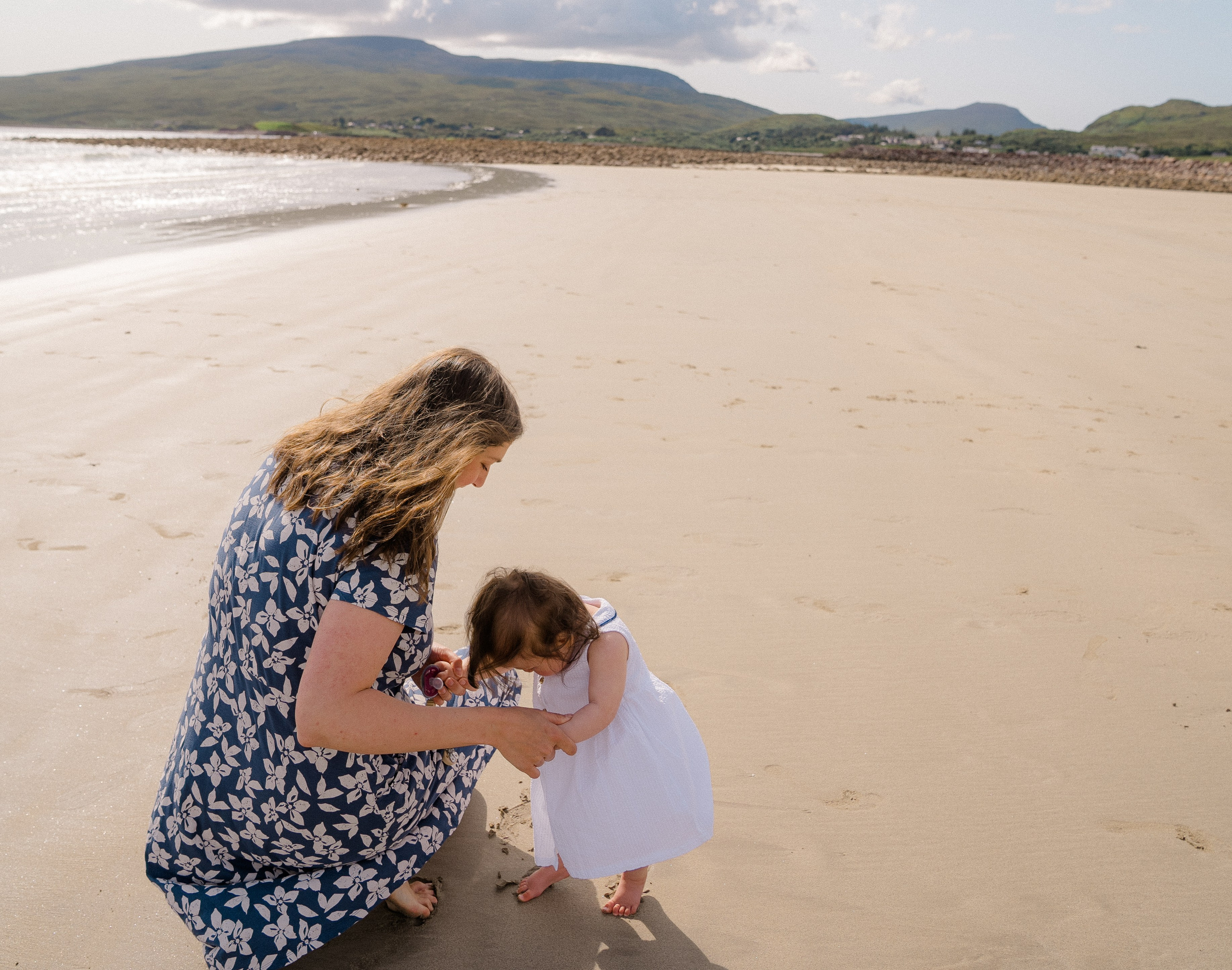 Darya and Mia at the ocean. Wedding and family photographer Ireland