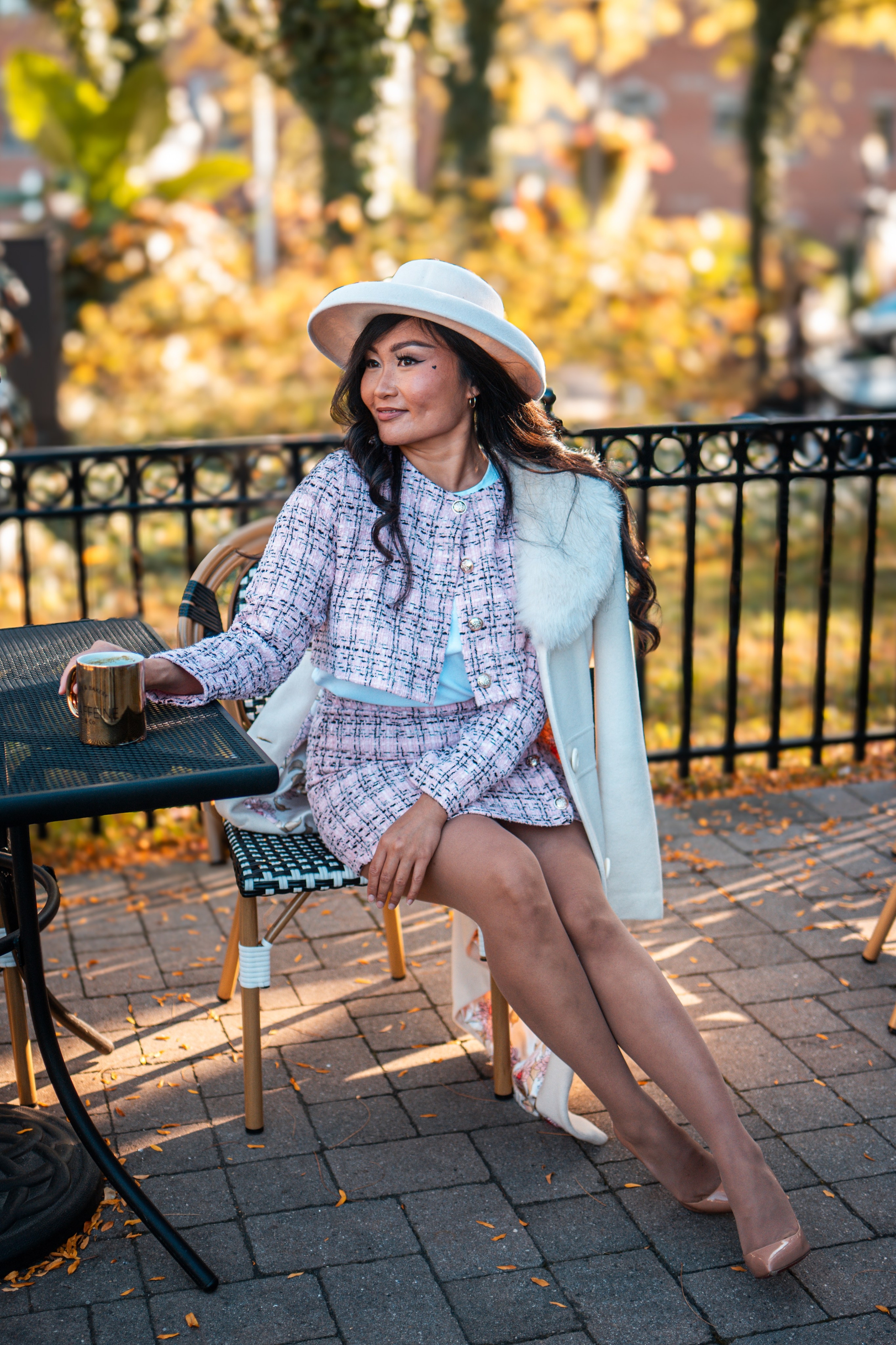 Portrait photography with a twist—an individual session in a Windsor café, capturing your creativity against a chic backdrop.