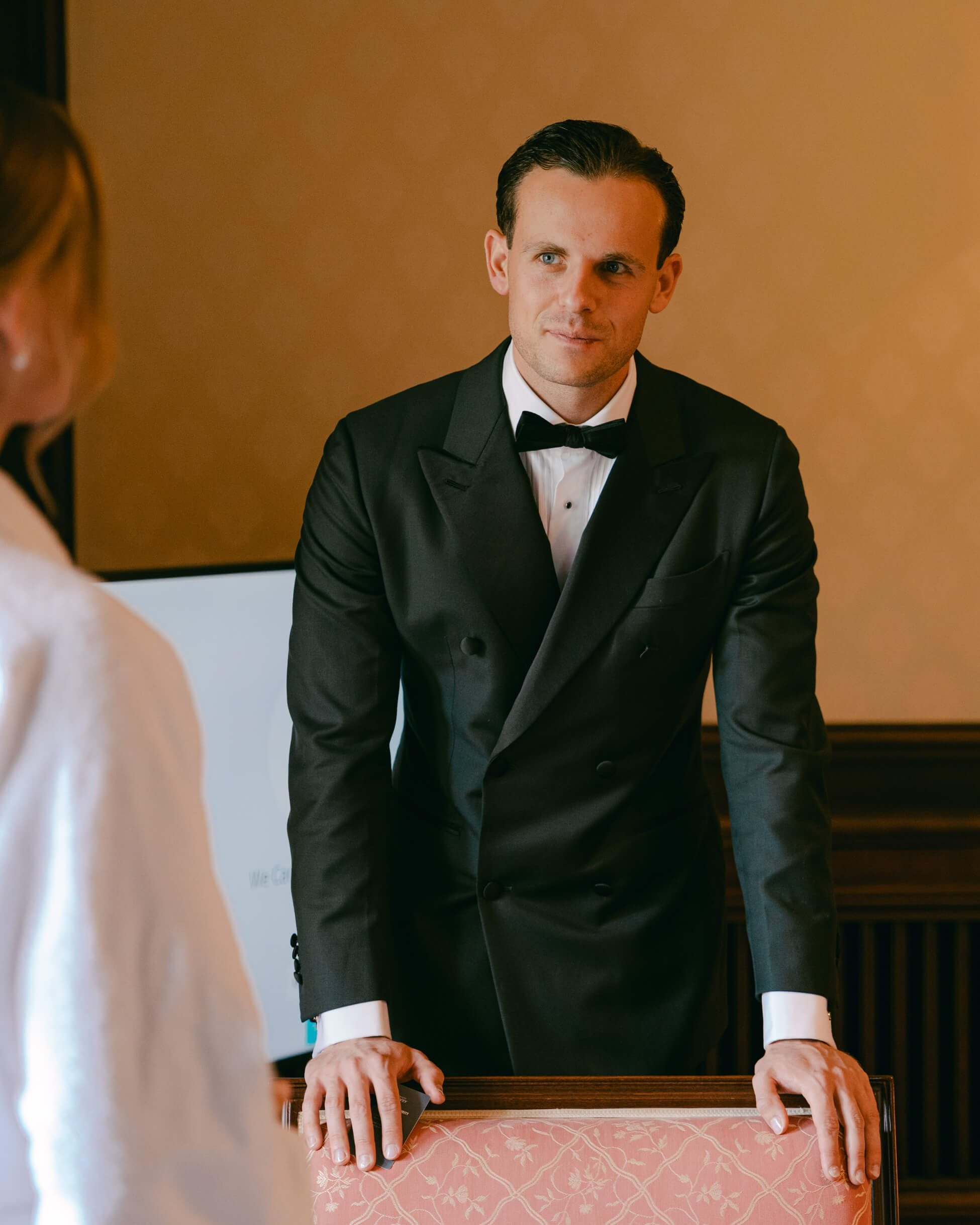 Groom portrait in formal dinner jacket and bow tie, luxury black tie wedding Frankfurt Villa Rothschild