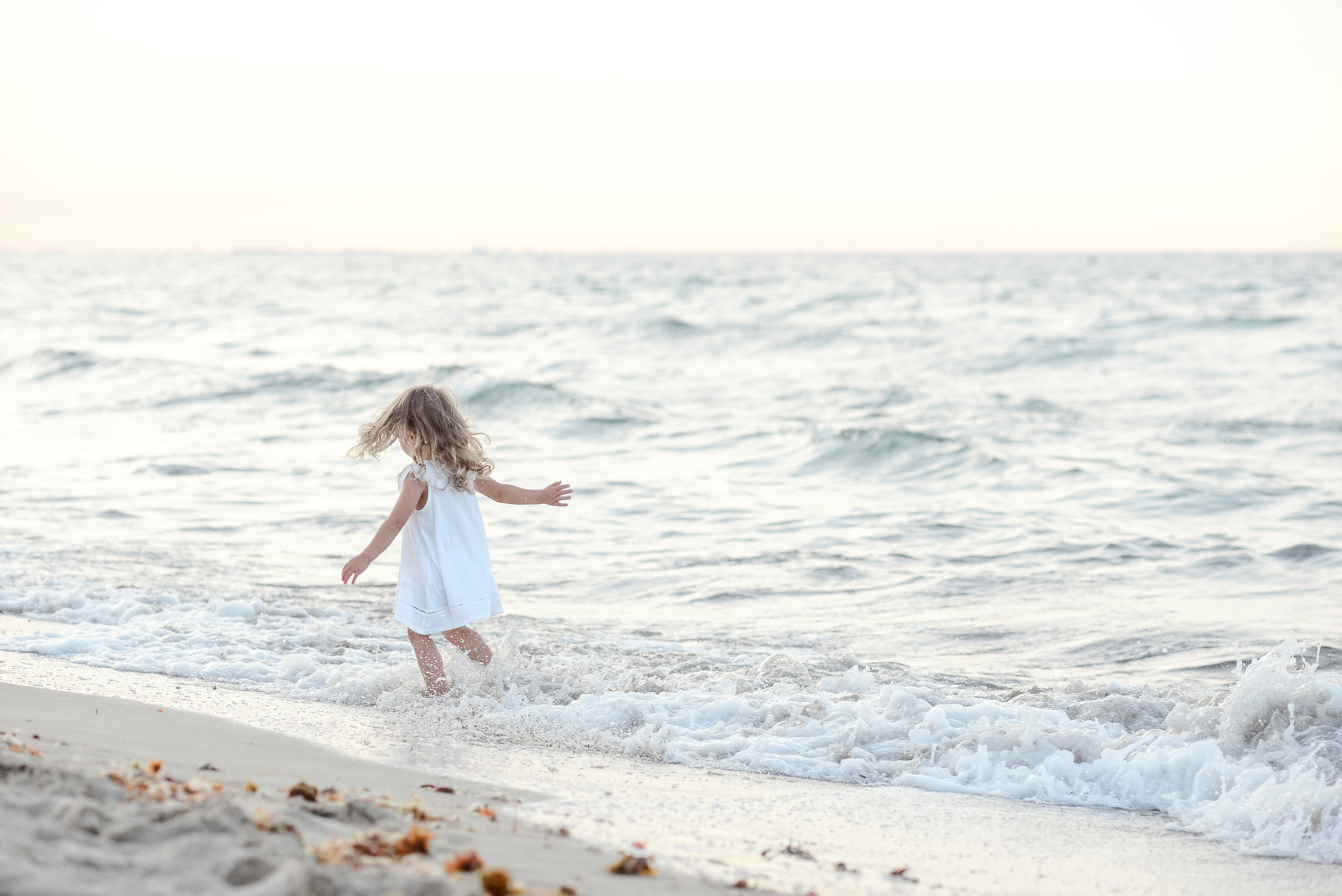 A girl walking on the beach