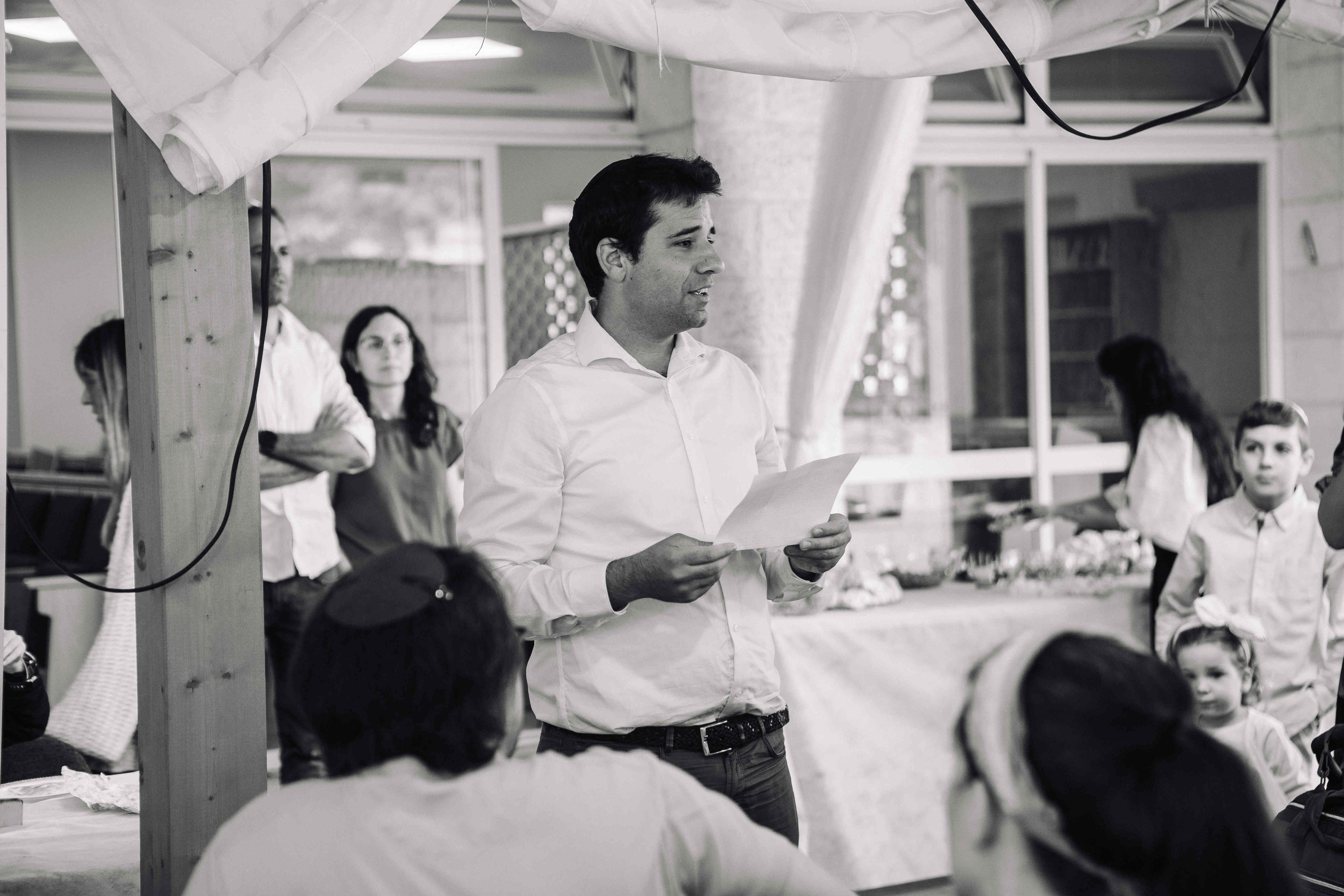 BRITH MILA IN THE SMALL SYNAGOGUE. PHOTOGRAPHER IN ISRAEL