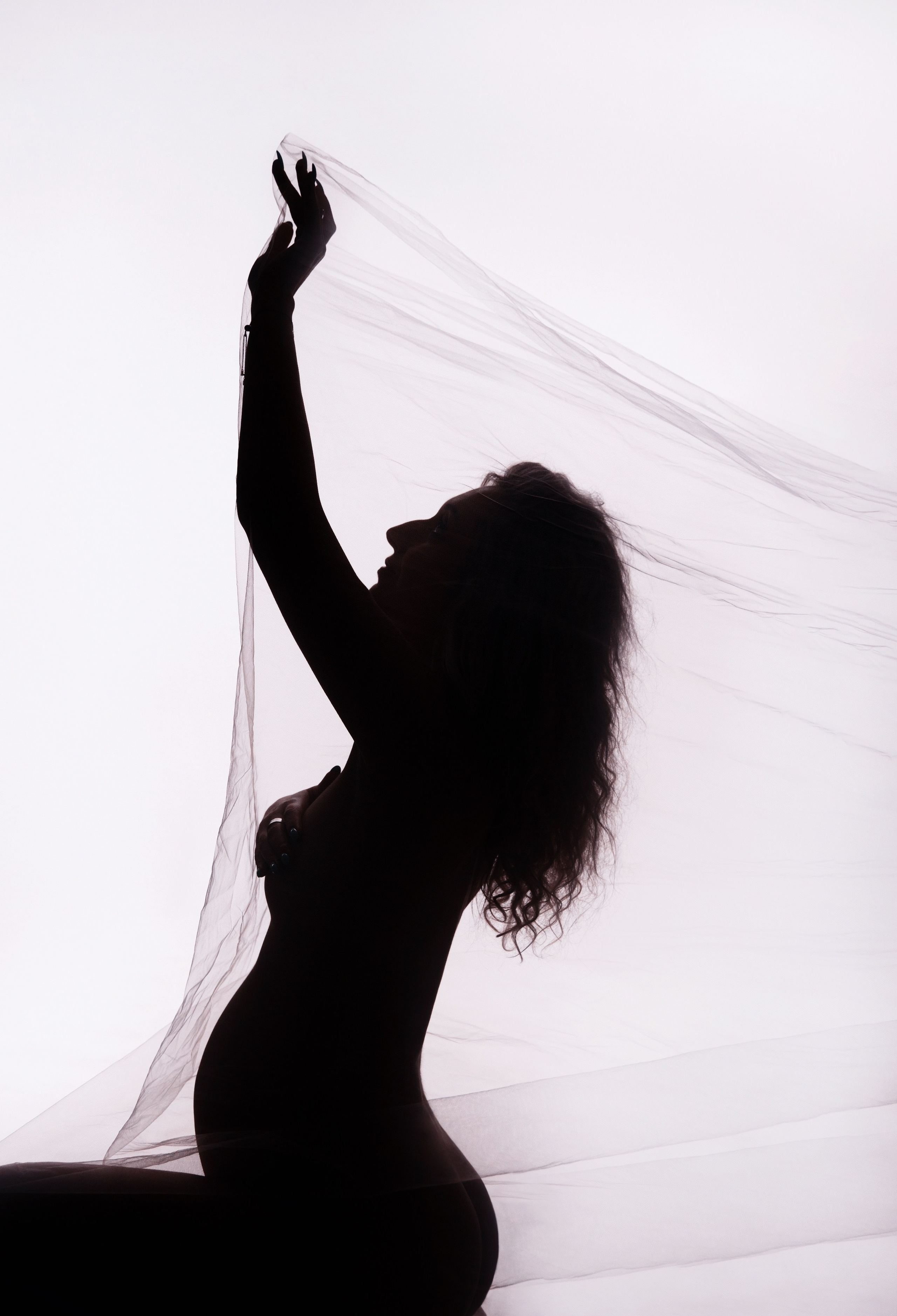 Studio pregnancy photoshooting for Alina and Michael. Home