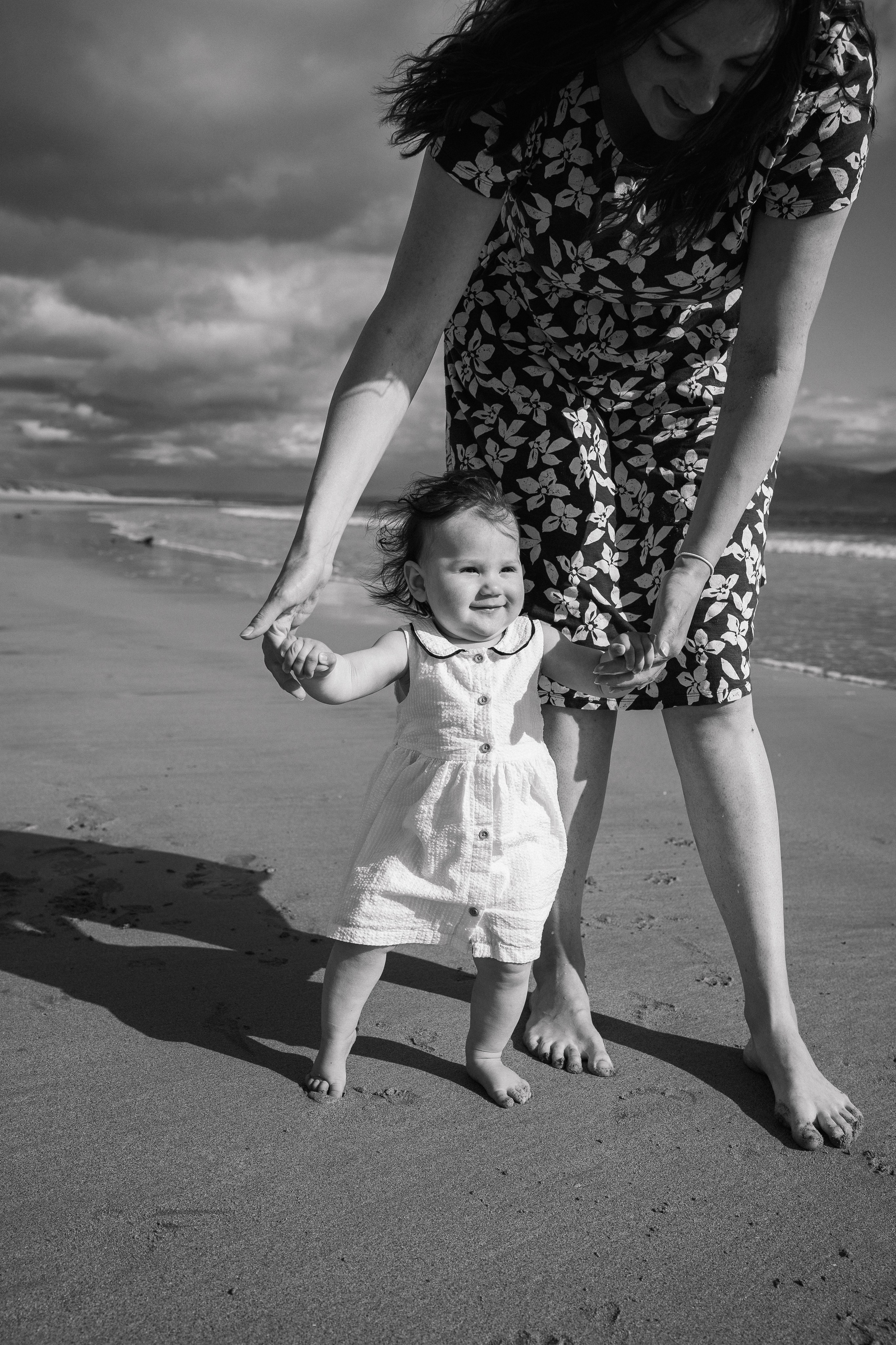 Darya and Mia at the ocean. Wedding and family photographer Ireland