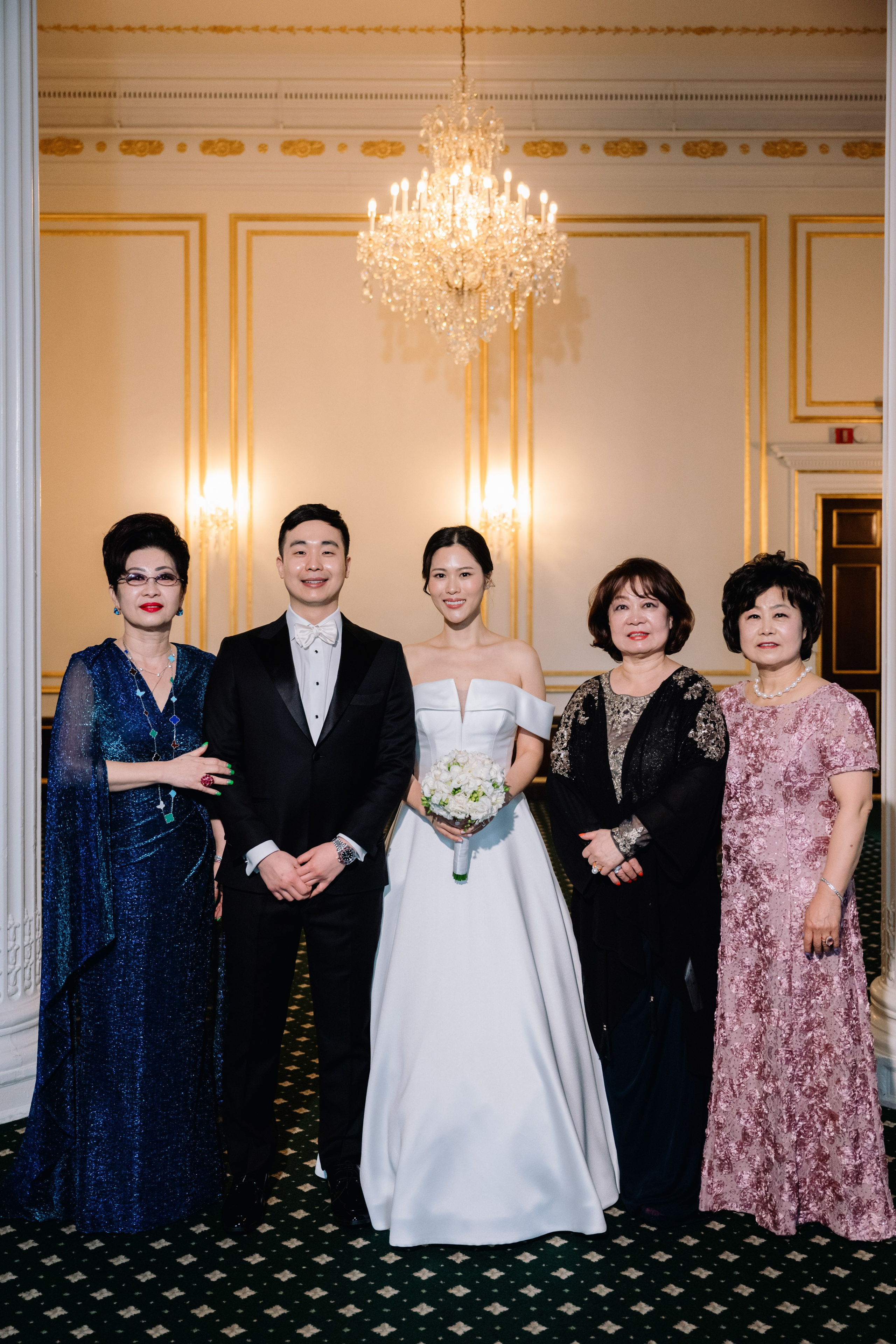 a group of people standing in a room