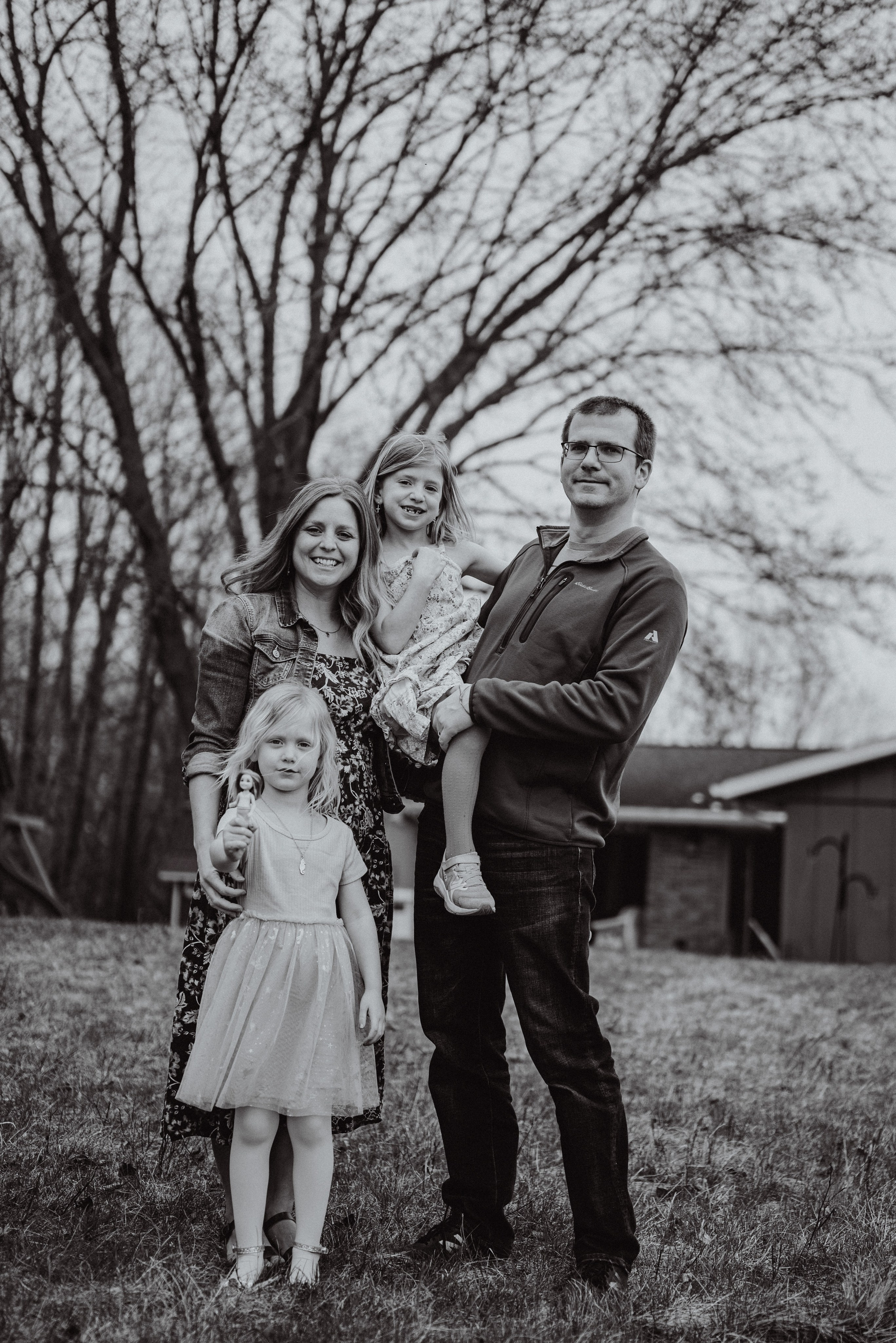 Creative family and portrait photographer in Green Bay, Wisconsin, known for unique and artistic family photography sessions that capture authentic connections.