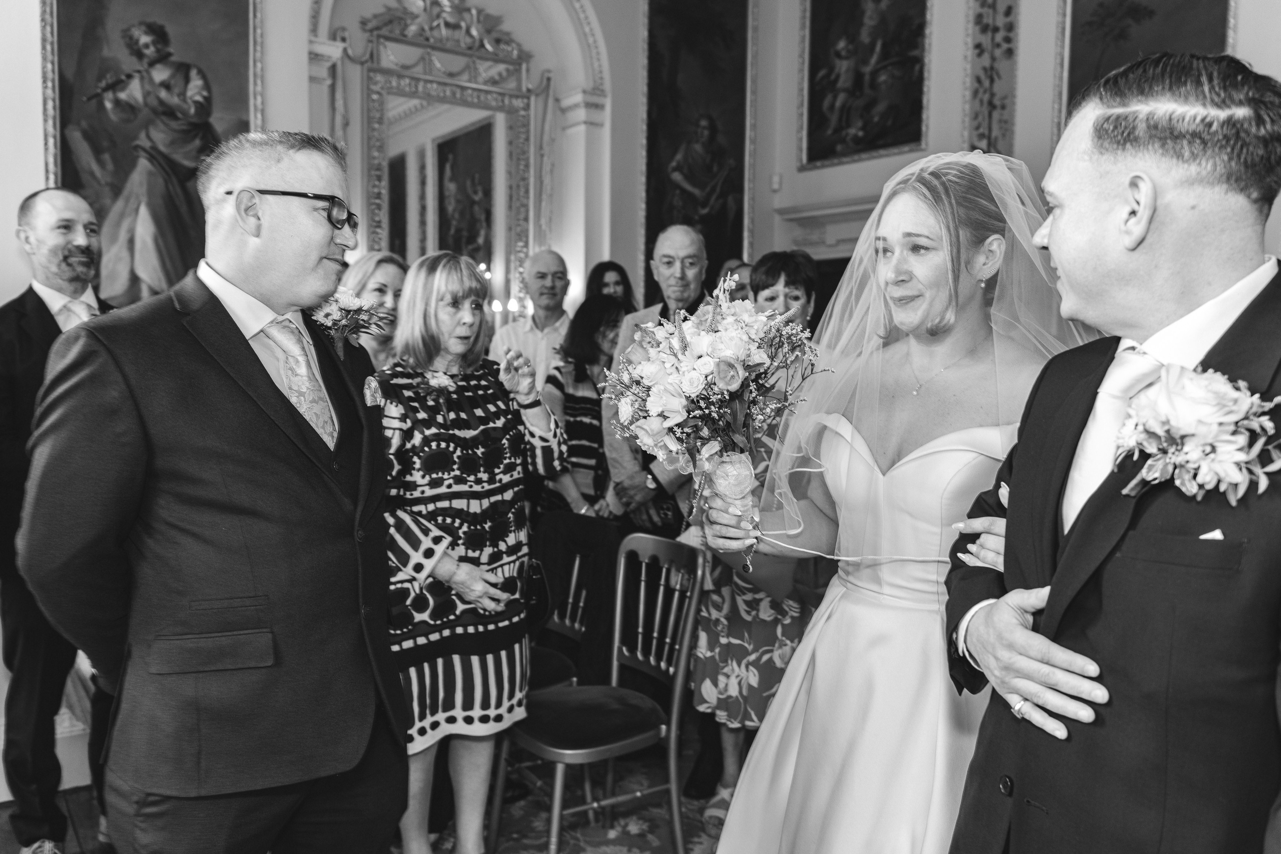 Luke and Nicola's first look moment at Danson House, captured by wedding photographer Ekaterina Romanova