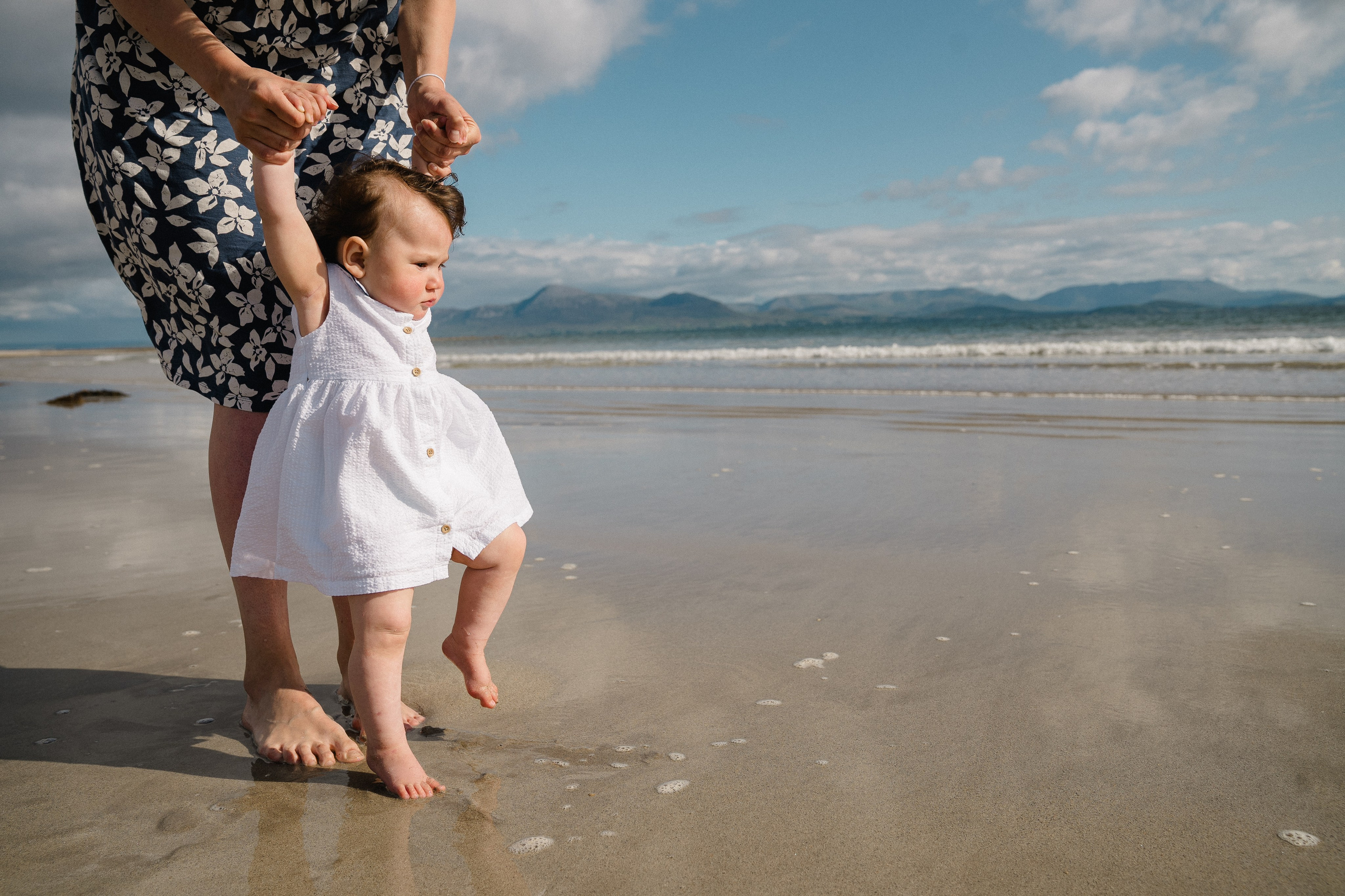 Darya and Mia at the ocean. Wedding and family photographer Ireland
