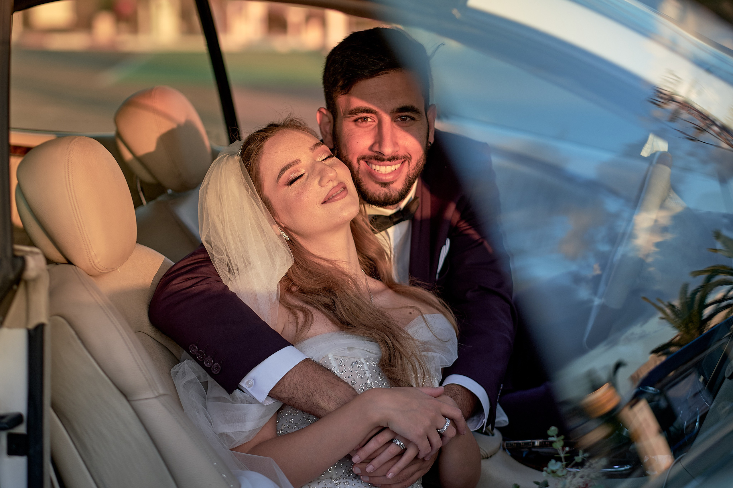 Love Story , wedding Romantic wedding couple portrait, bride with veil and groom in suit, emotional wedding photography by Maxim Polak Israel