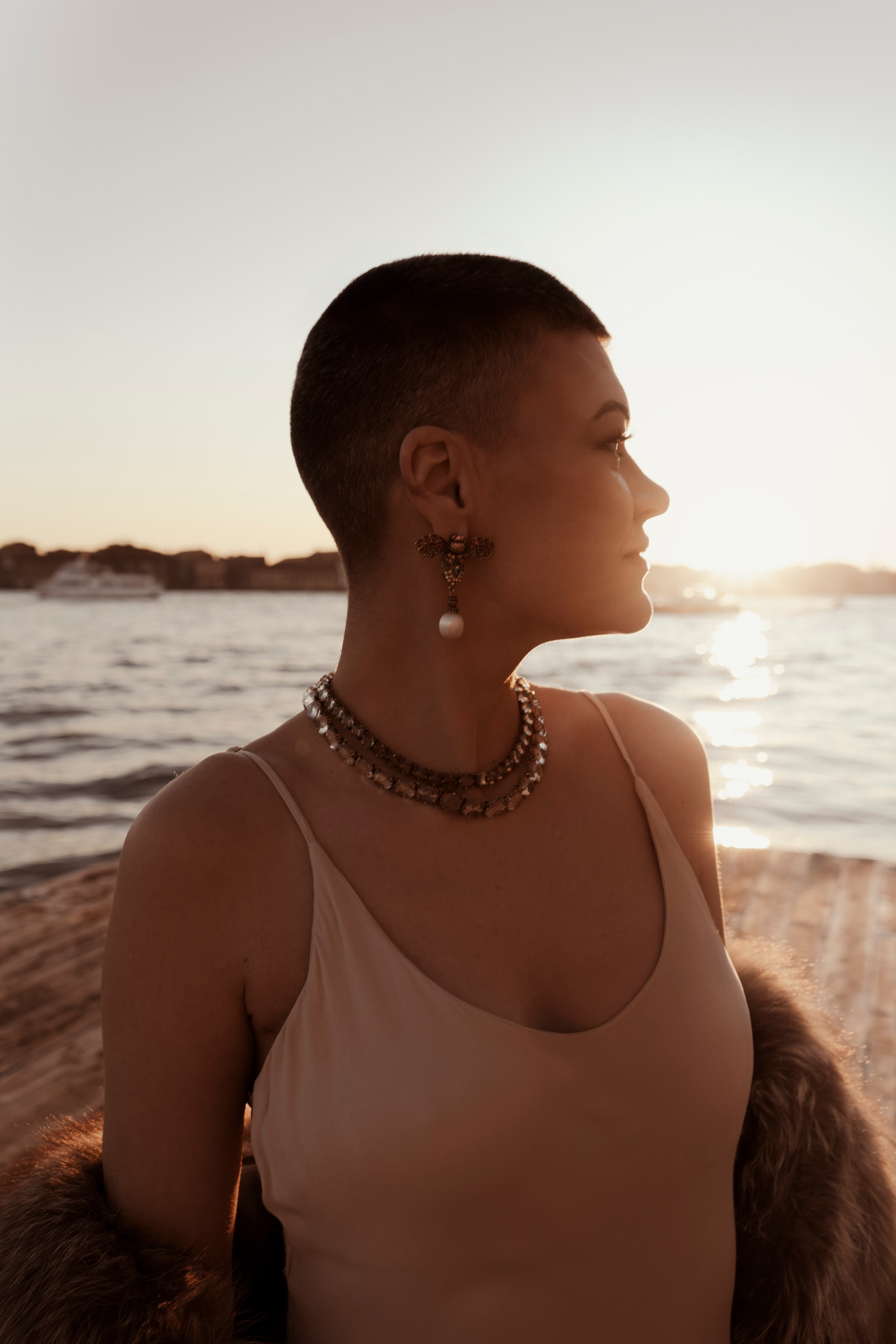  High-fashion photoshoot Venice with golden hour light near Piazza San Marco.