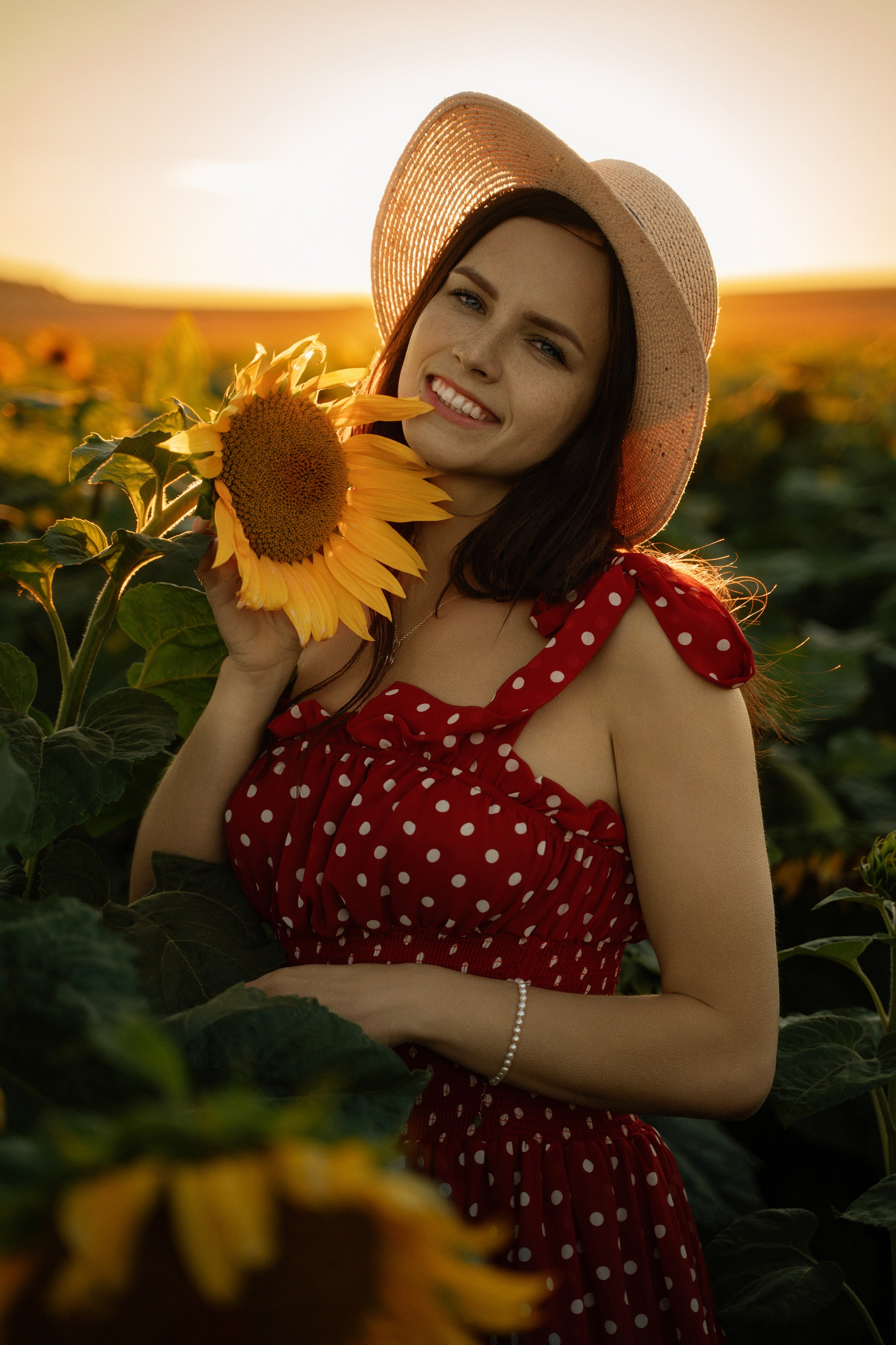 Sunset portrait of young female model in sunflower field, Marbella photographer