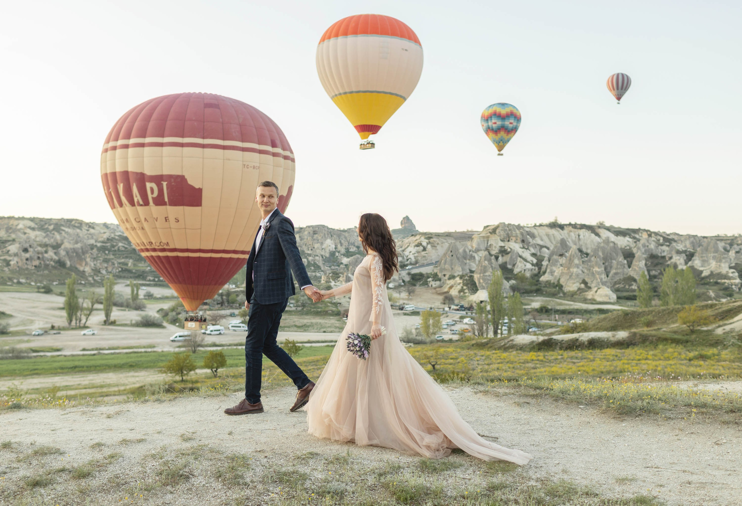 Magical Wedding Photoshoot in Cappadocia: Balloons, Caves, and Valleys. Julia Ganch I Fashion Wedding Photography I Cappadocia Turkey