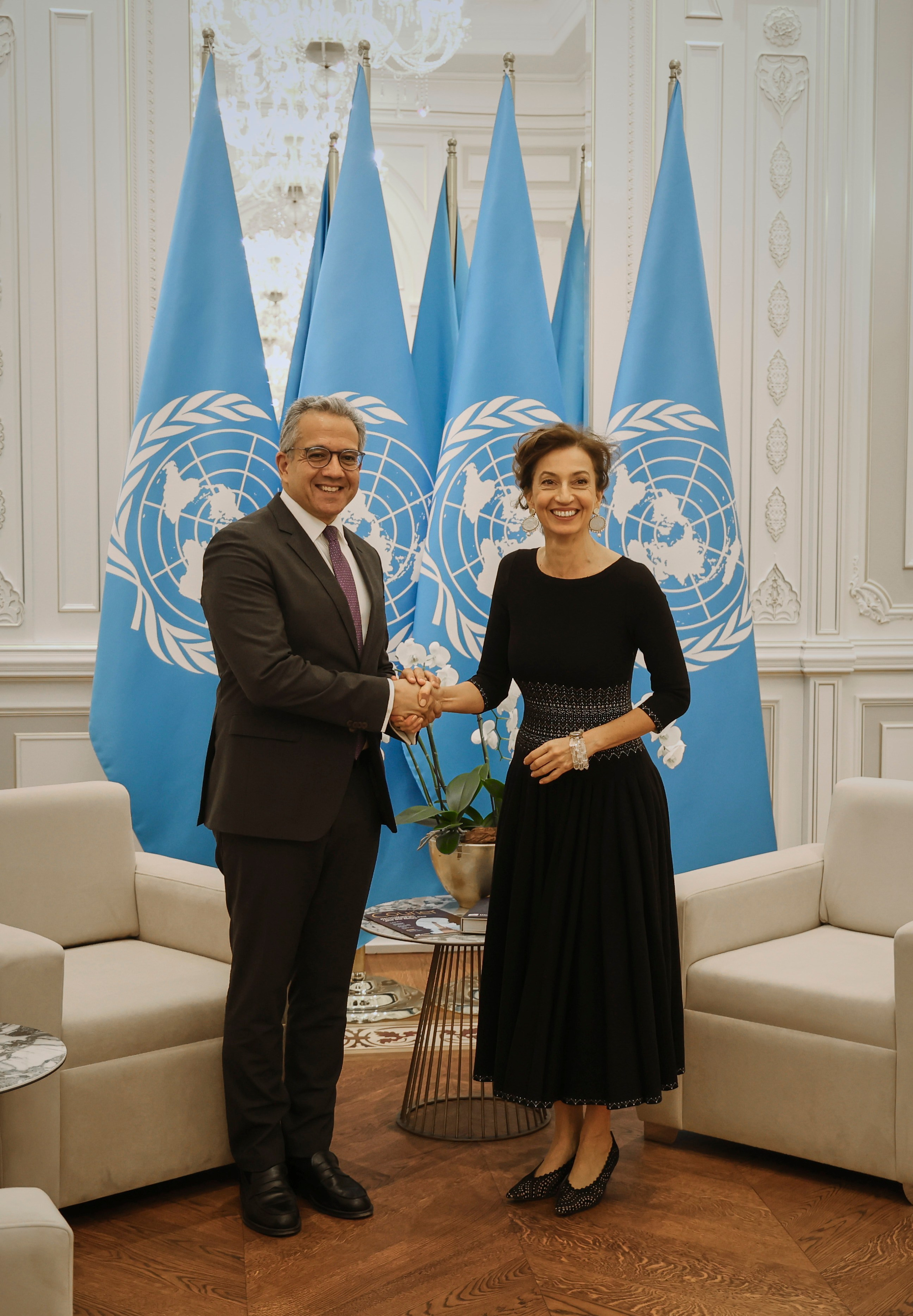 UNESCO meeting participants with Samarkand architecture in the background