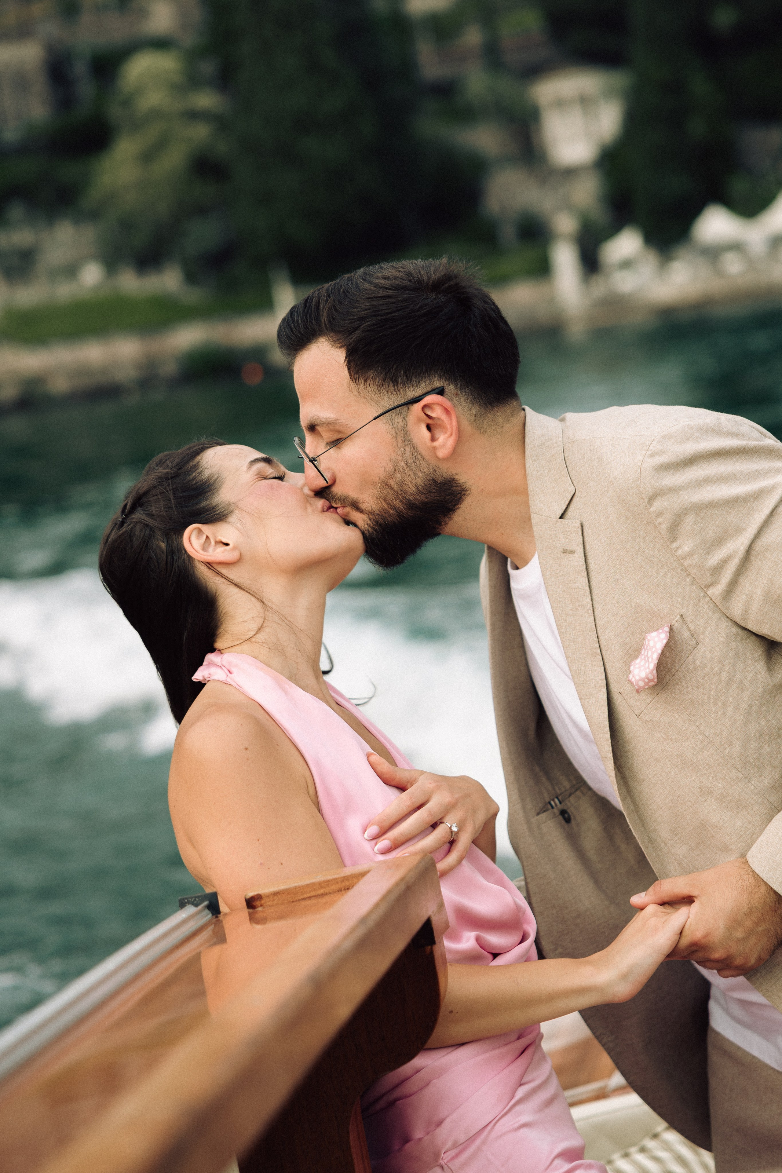 Newly engaged couple celebrating their love in the beautiful setting of Lake Como