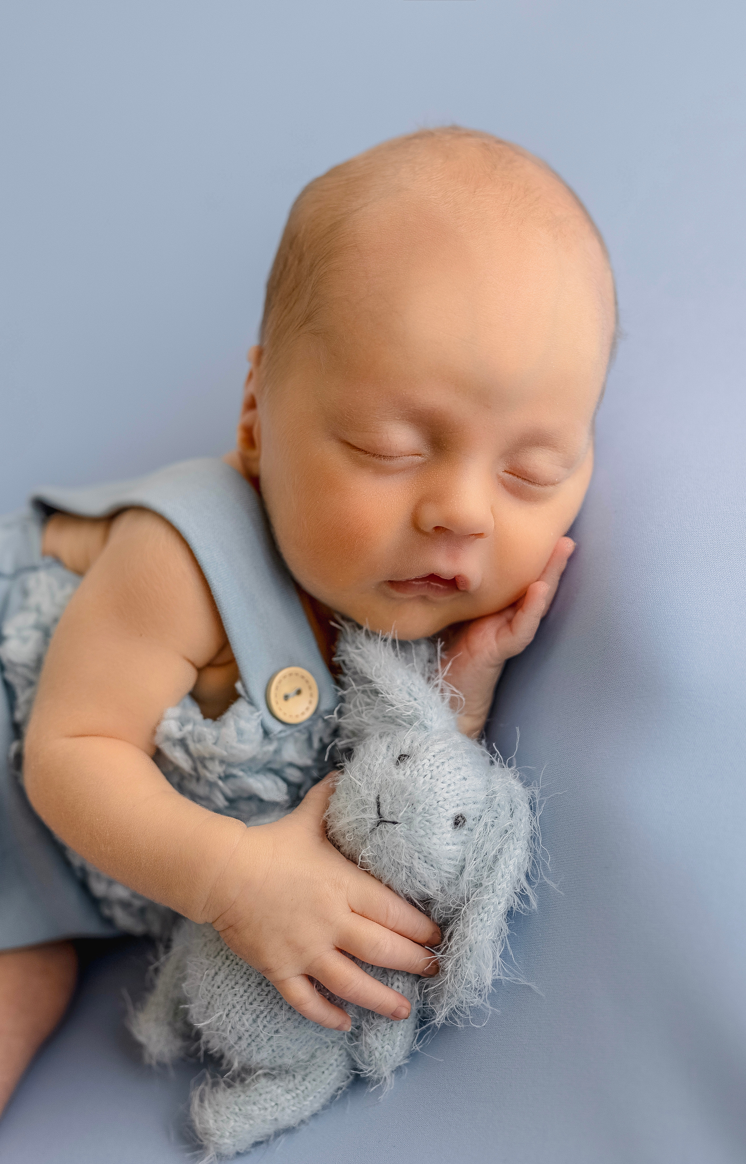 Geënsceneerde newborn fotografie