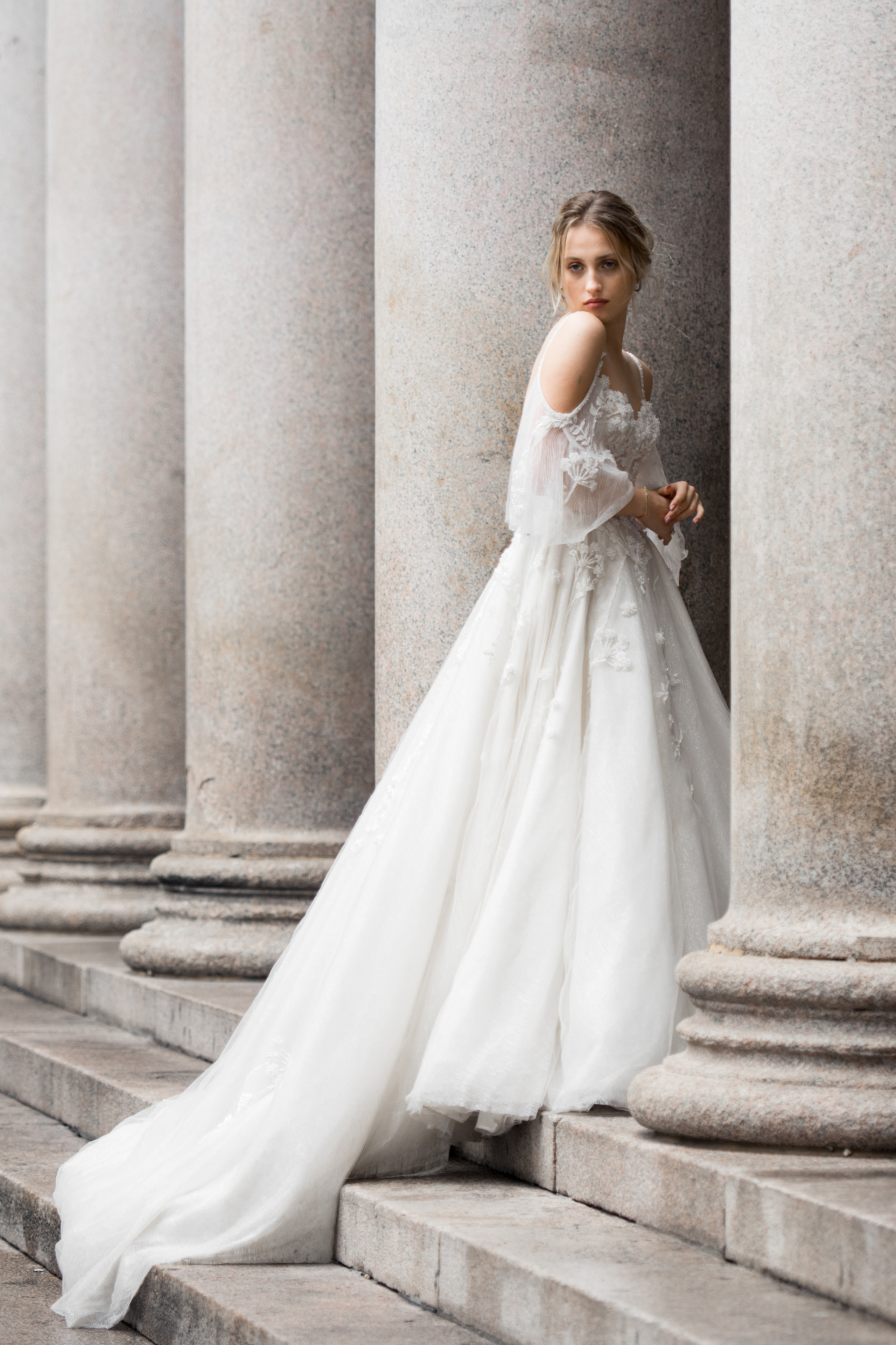 A beautiful bride in a wedding dress is waiting for his bride in Milan, Italy