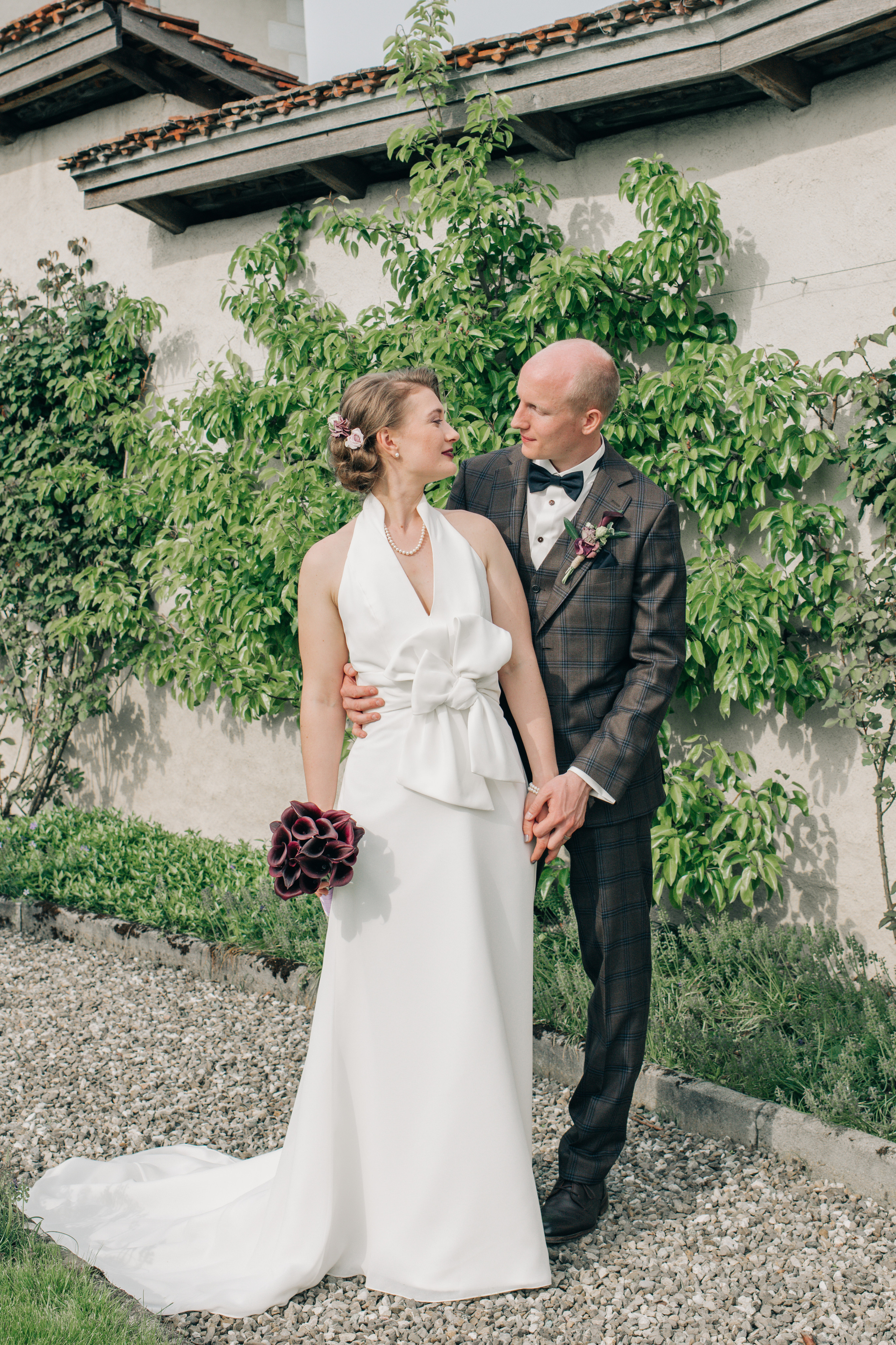 A wedding couple in a garden