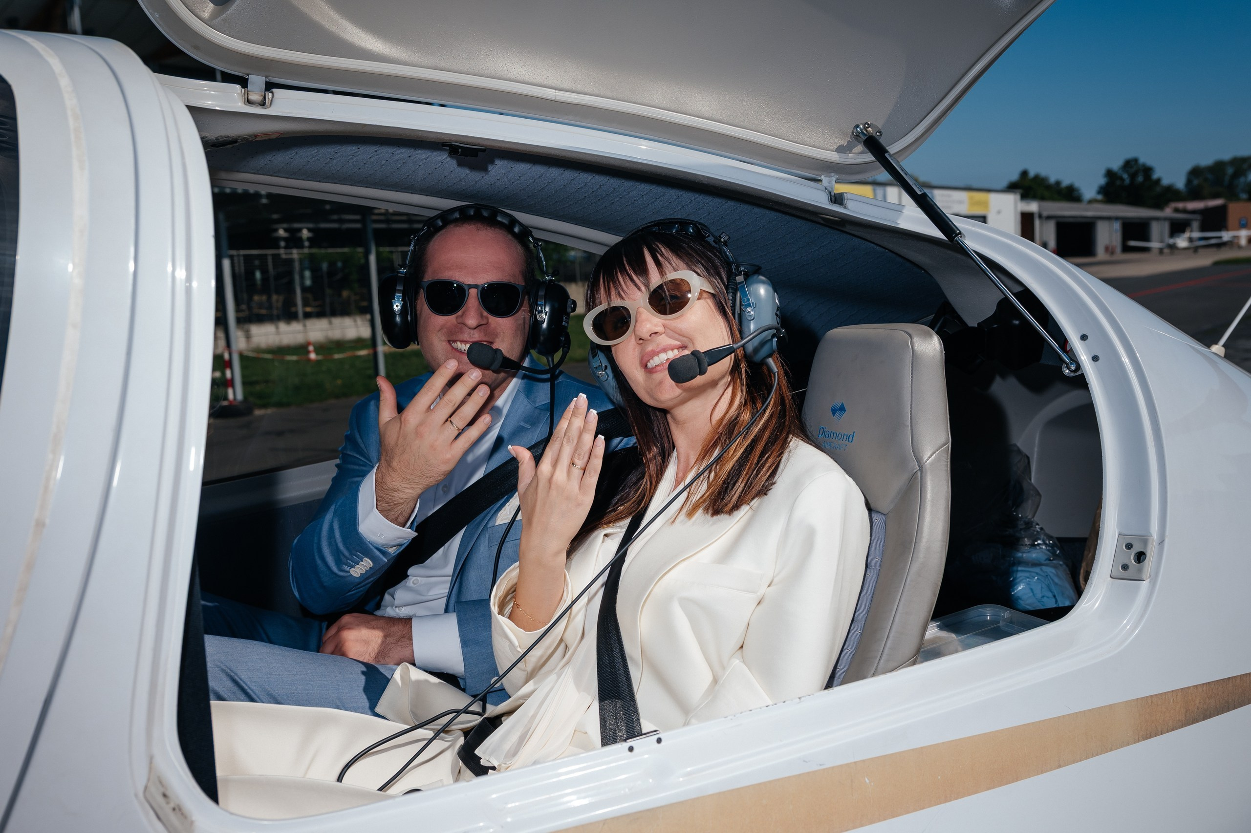 couple show the wedding rings