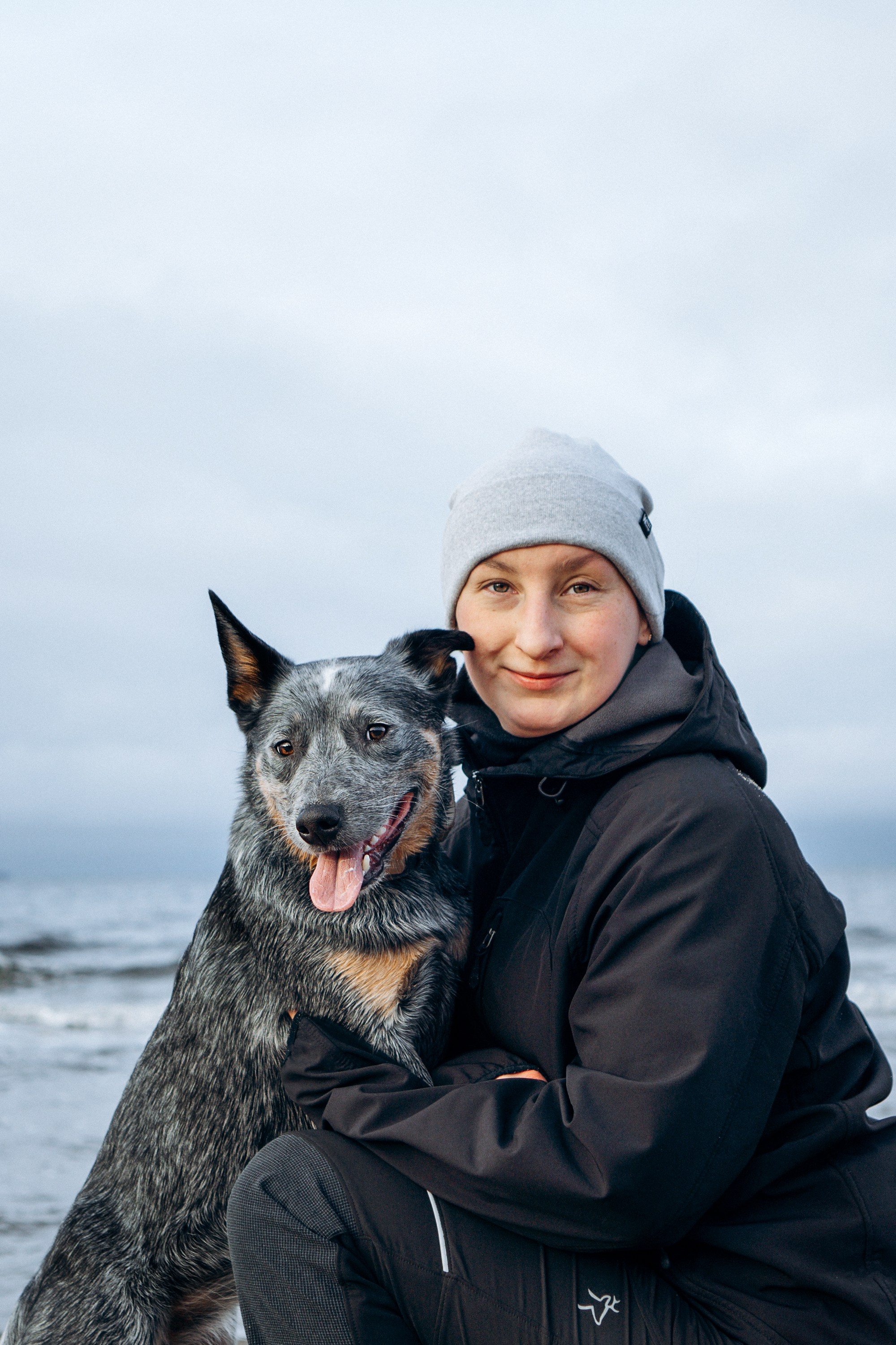 Polina and her Dakota, Australian Cattle Dog. Kat Laisaar — Pet photographer in Tallinn