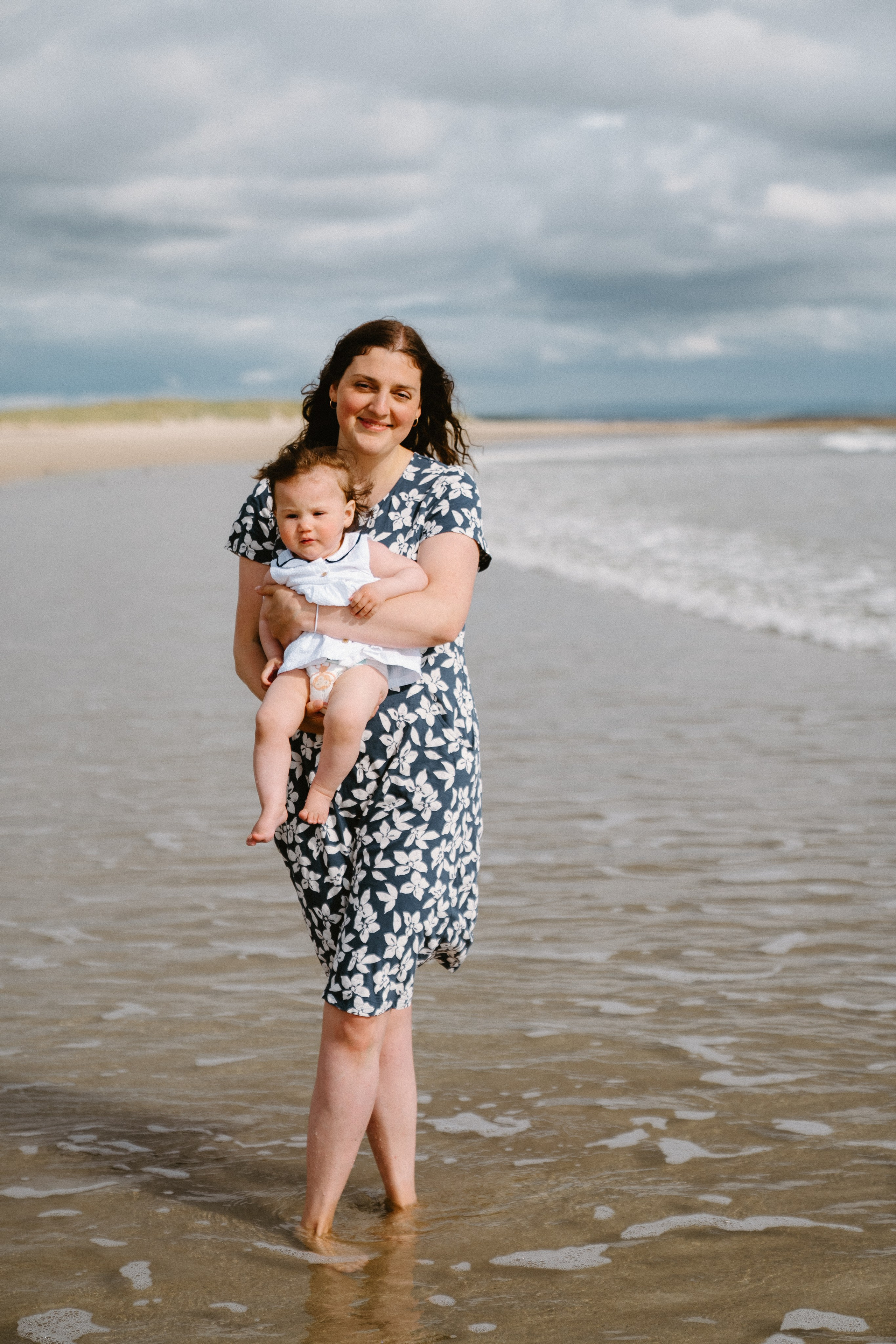 Darya and Mia at the ocean. Wedding and family photographer Ireland
