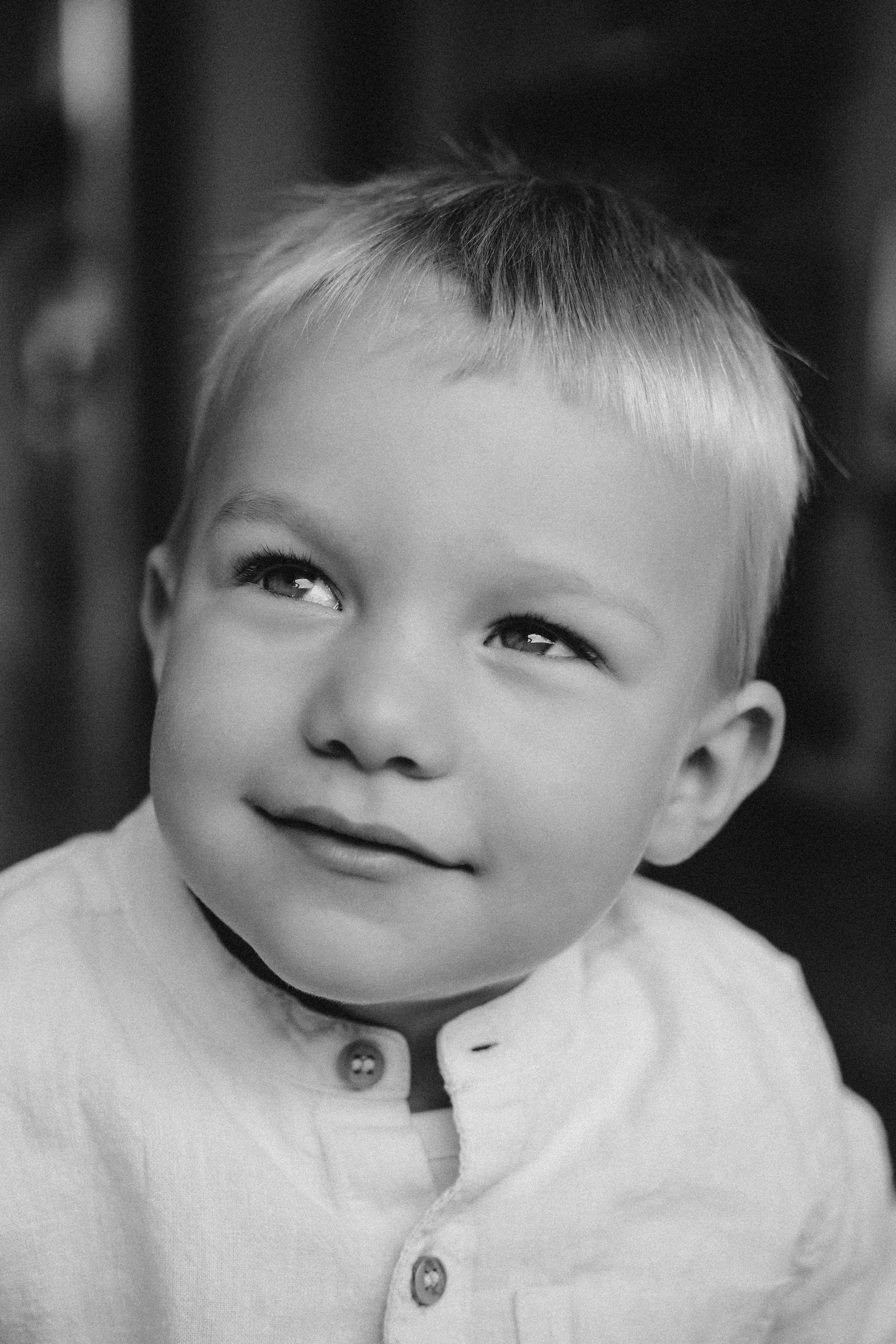 Black and white portrait of a baby during a natural family photography session in Solihull