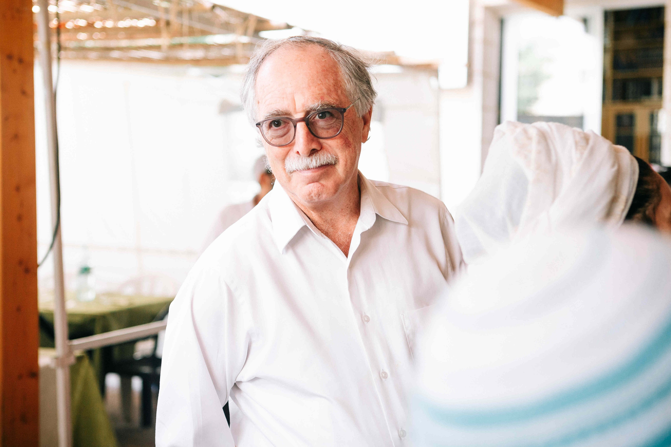 BRITH MILA IN THE SMALL SYNAGOGUE. PHOTOGRAPHER IN ISRAEL