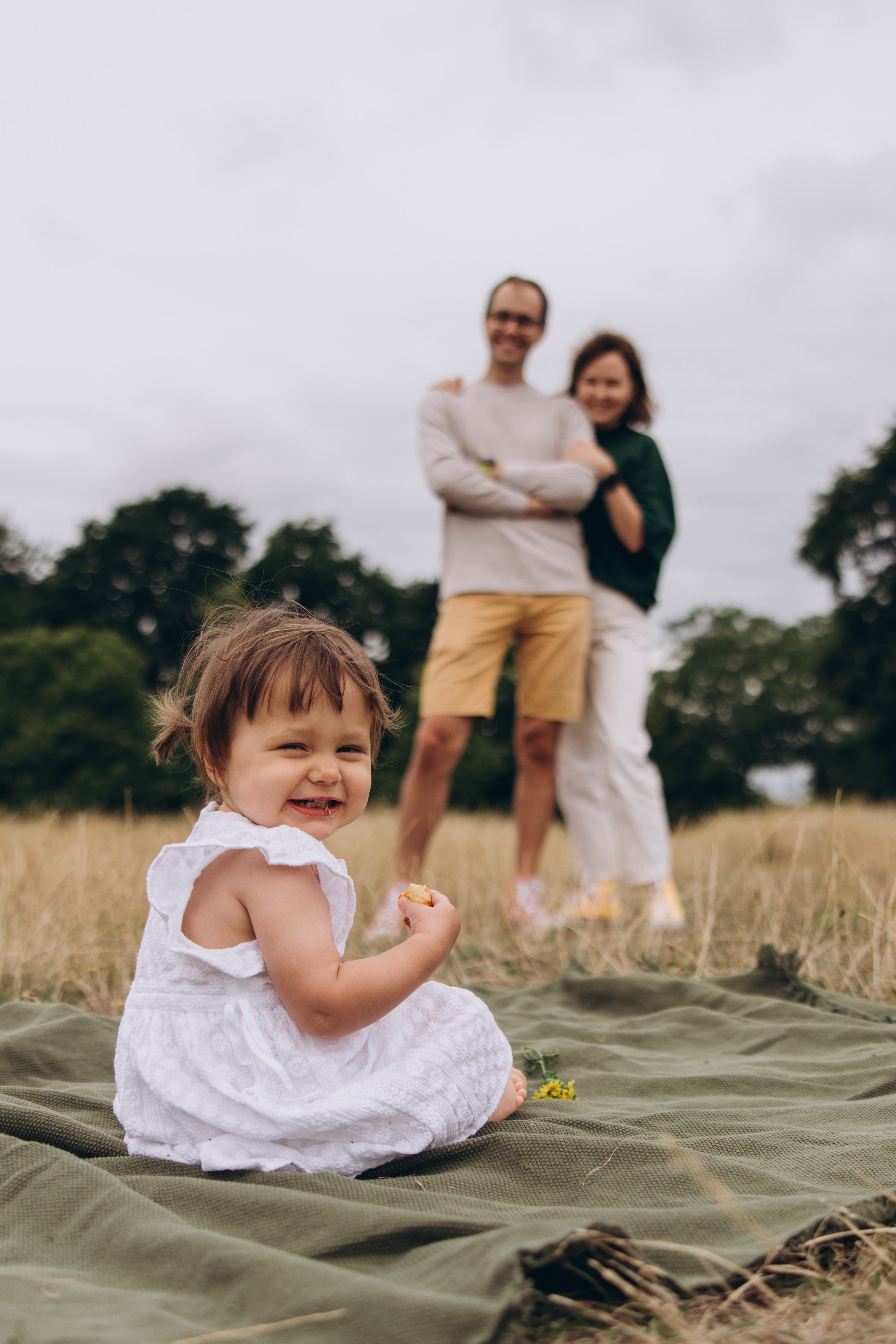 Milena with parents (Greenwich Park). Anastasia Klink, Photographer in London
